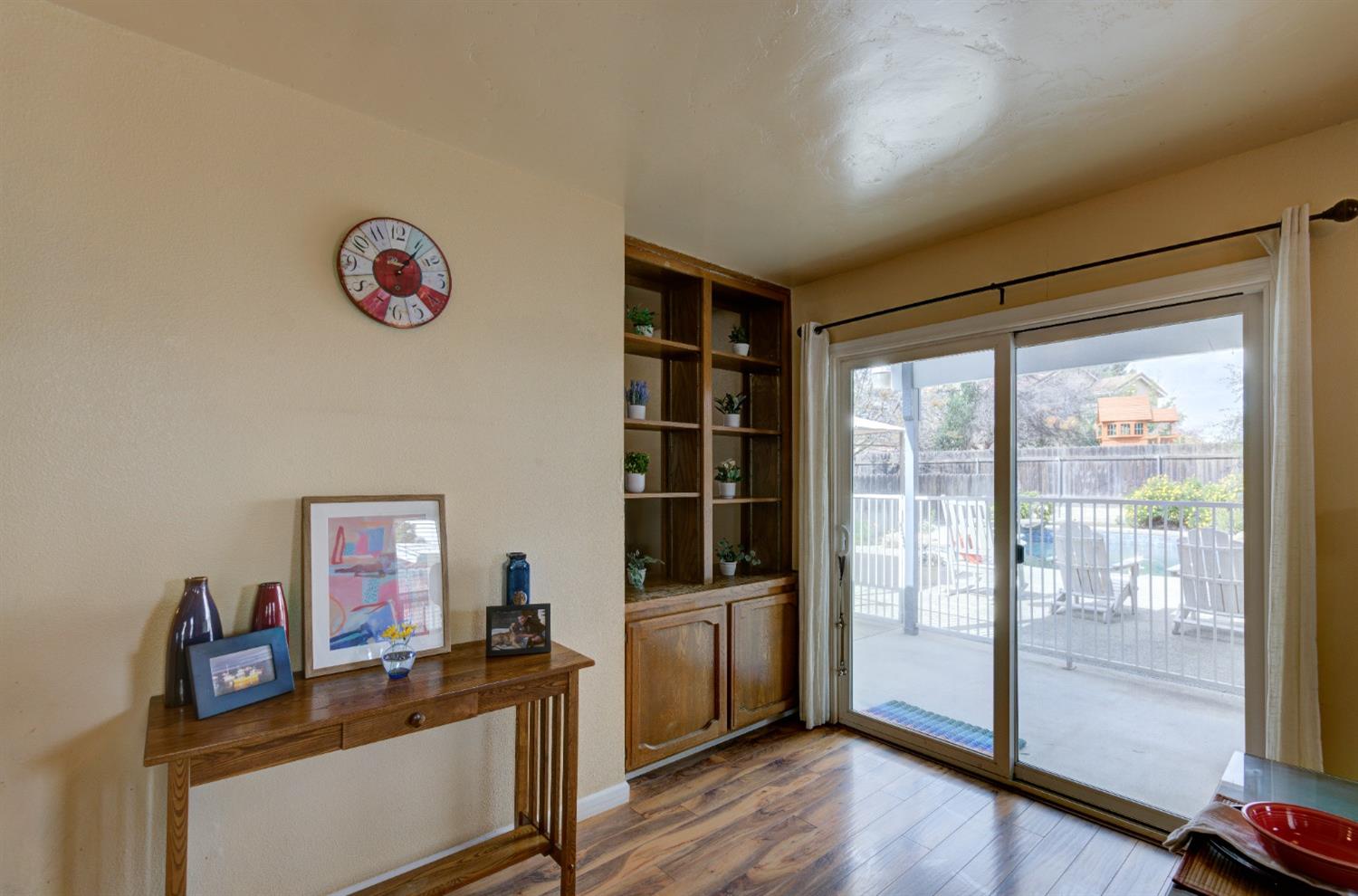 695 West Polson Avenue Clovis, CA 93612 - Photo 14 of 27 a view of a workspace with furniture and a window