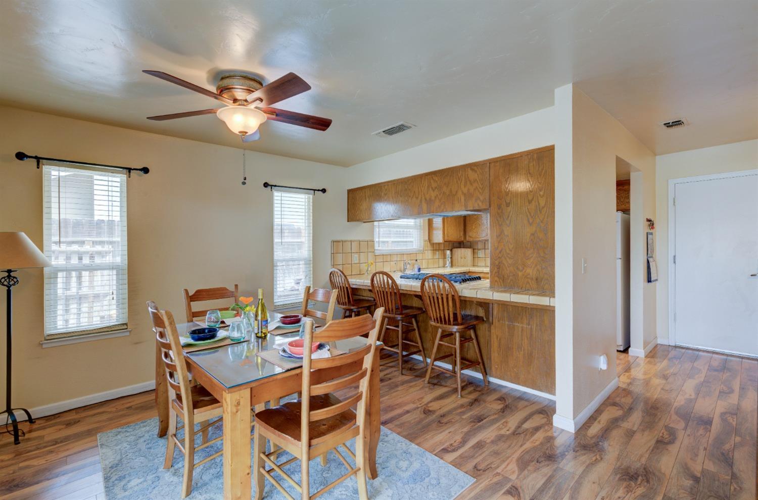 695 West Polson Avenue Clovis, CA 93612 - Photo 8 of 27 a view of a dining room with furniture window and wooden floor
