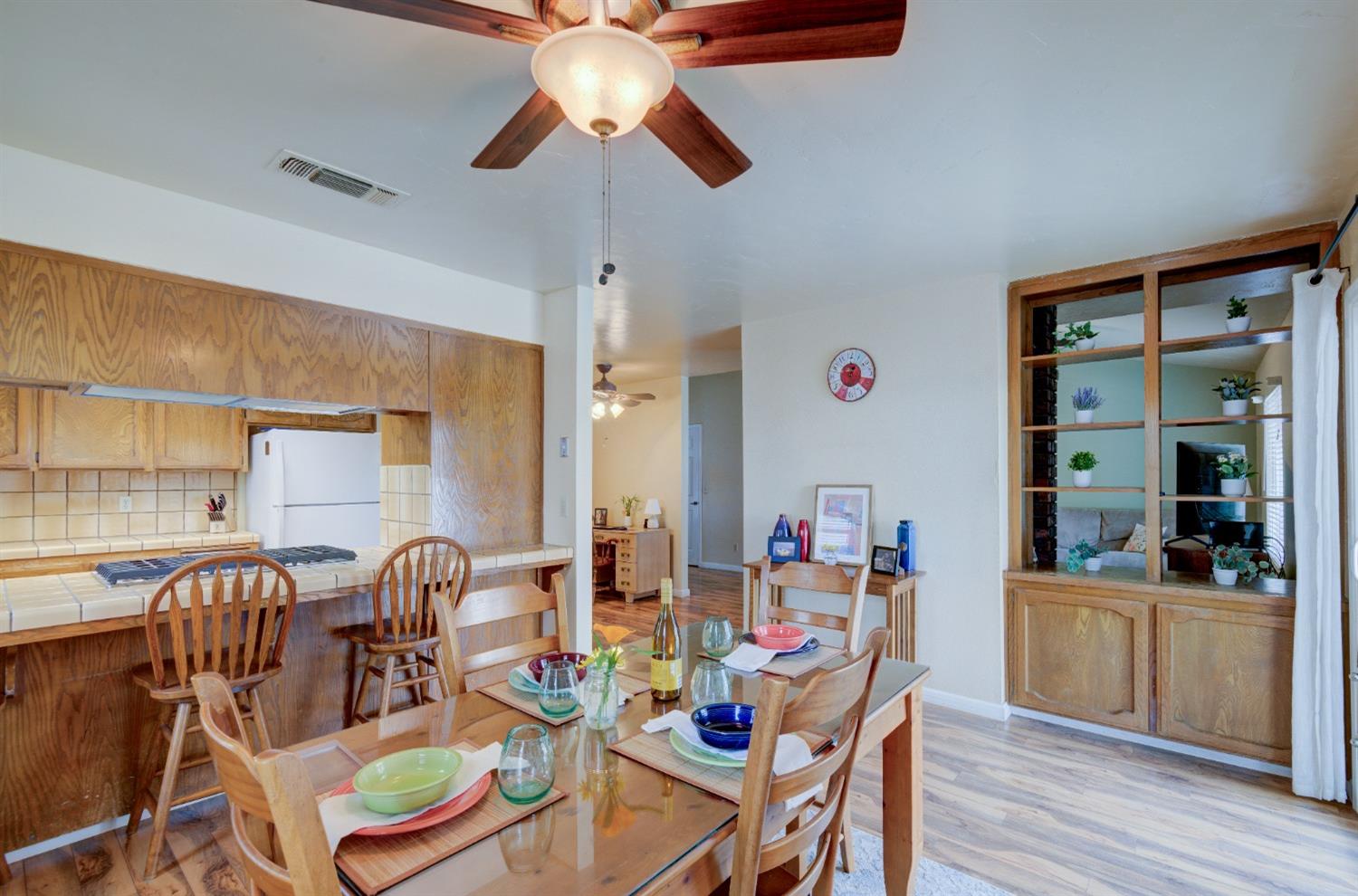 695 West Polson Avenue Clovis, CA 93612 - Photo 10 of 27 a dining room with furniture and wooden floor