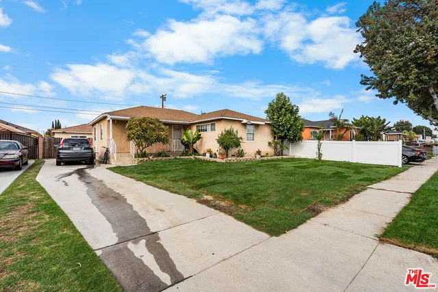 a view of a street with a building in the background