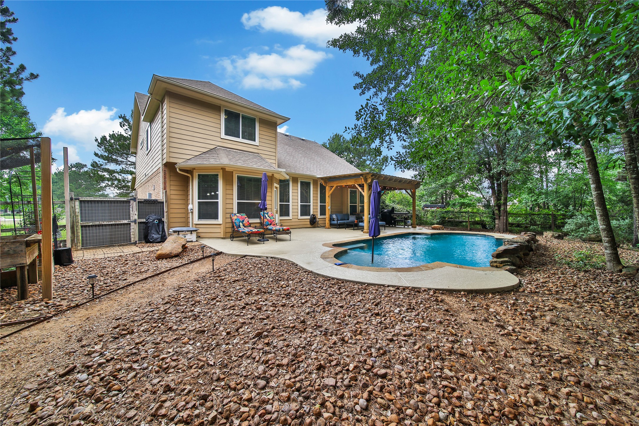 9223 Wapiti Trail Conroe, TX 77303 - Photo 41 of 45 a front view of a house with a yard