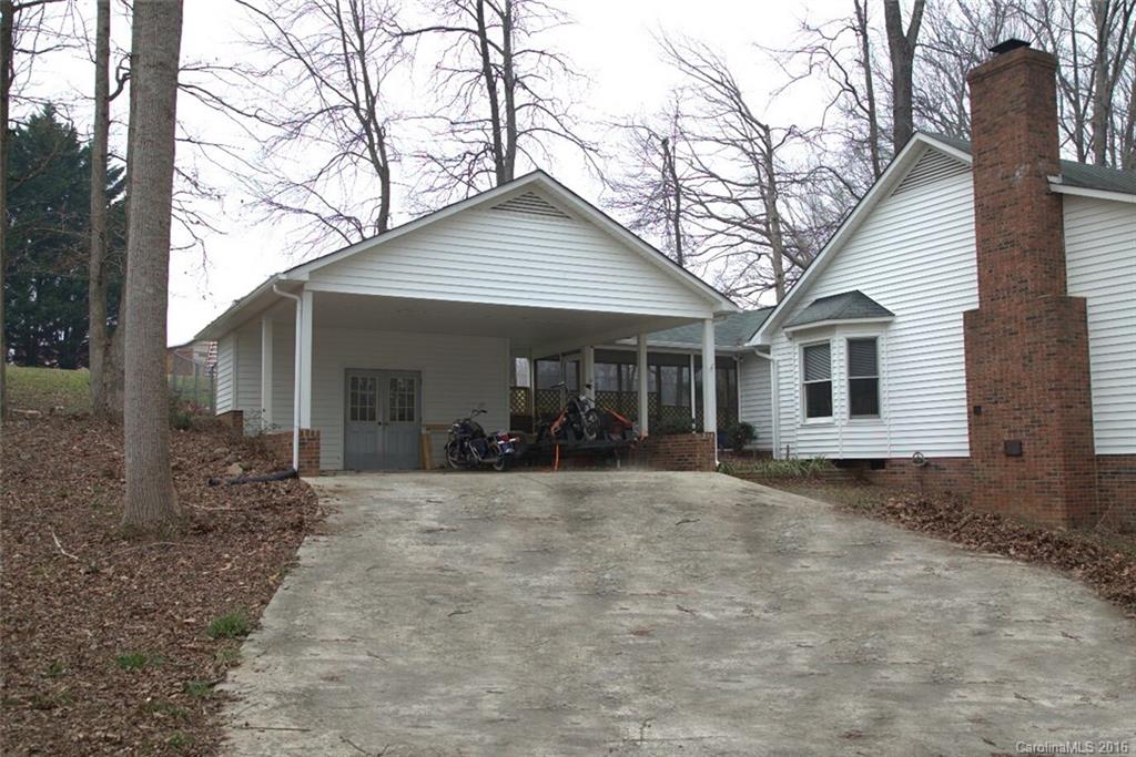2710 Blue Jay Road Heath Springs, SC 29058 - Photo 2 of 21 a view of a house with a yard covered in snow