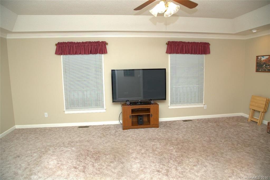 2710 Blue Jay Road Heath Springs, SC 29058 - Photo 4 of 21 a living room with furniture and a flat screen tv