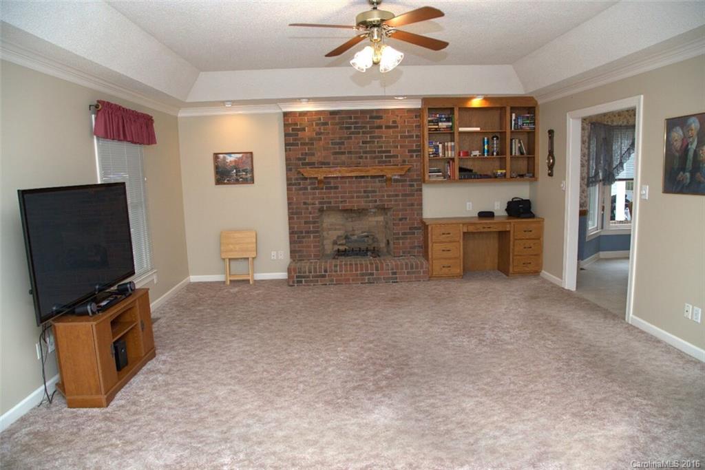 2710 Blue Jay Road Heath Springs, SC 29058 - Photo 5 of 21 a view of a livingroom with furniture and a flat screen tv