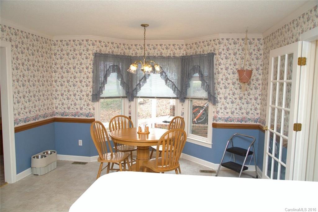 2710 Blue Jay Road Heath Springs, SC 29058 - Photo 7 of 21 a dining room with furniture and window