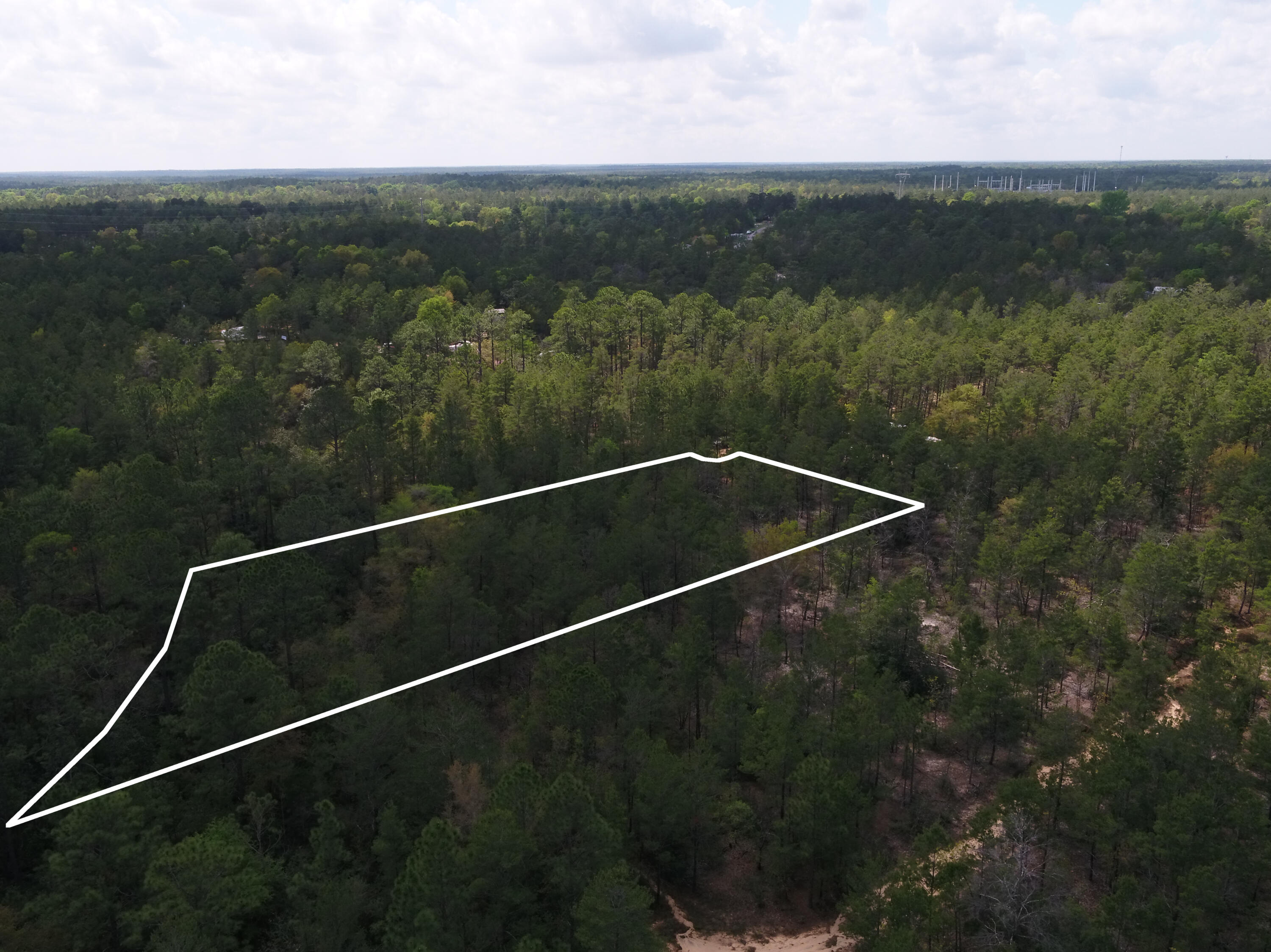 0 East Snapdragon Street DeFuniak Springs, FL 32433 - Photo 12 of 24 a view of a tennis court
