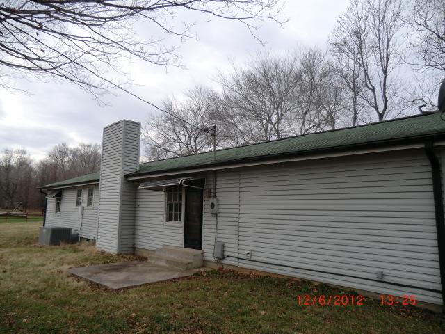 9423 Big Spring Creek Road Bon Aqua, TN 37025 - Photo 2 of 19 rear view