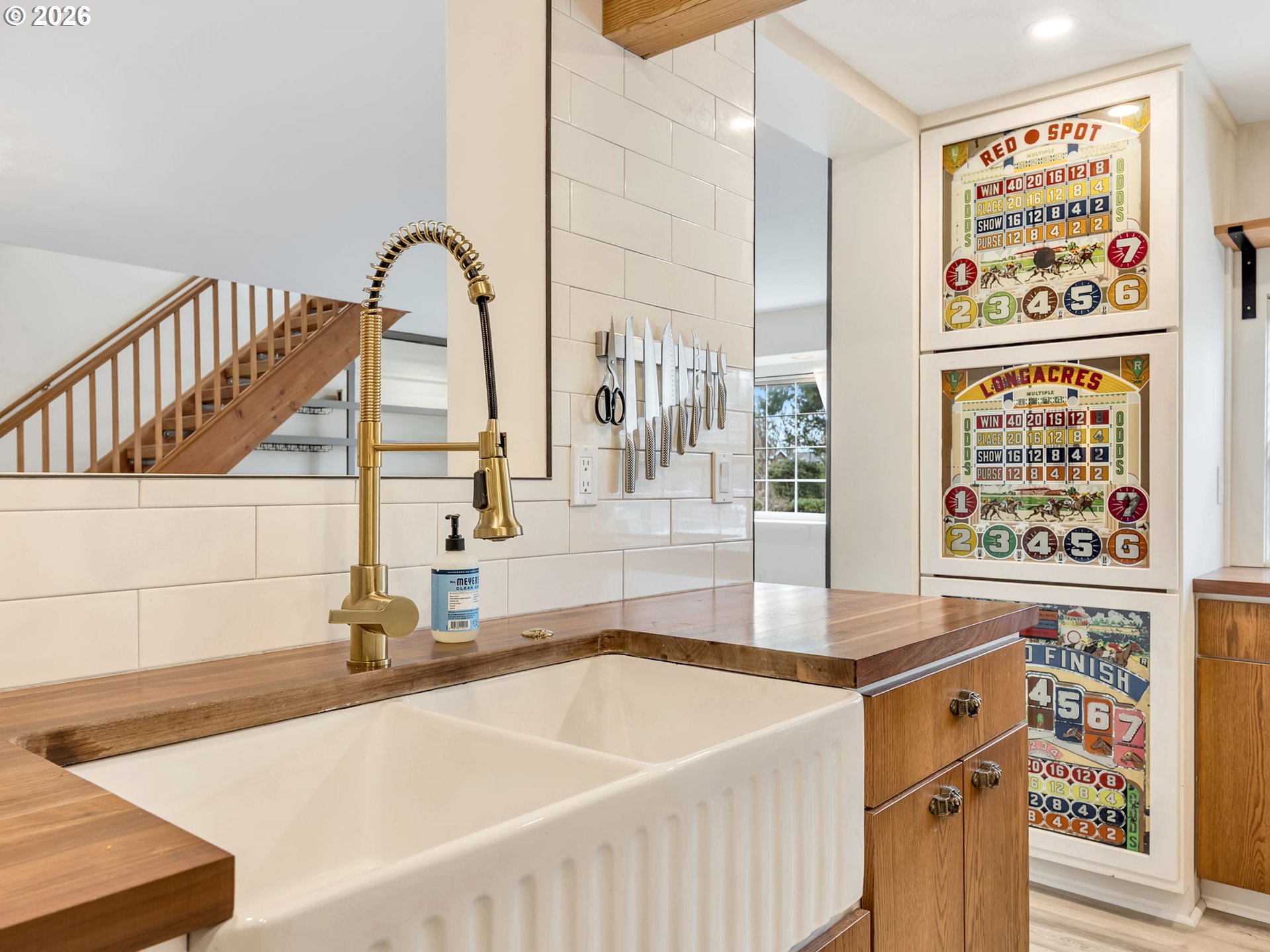 1761 South Edgewood Street Seaside, OR 97138 - Photo 12 of 48 a kitchen with a sink and a large window