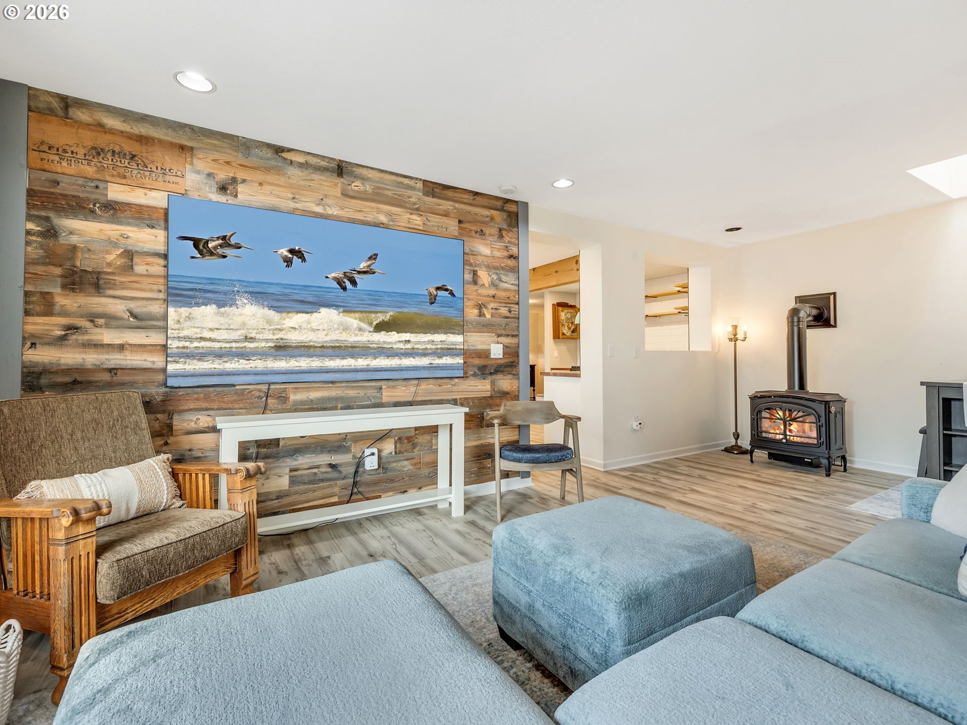 1761 South Edgewood Street Seaside, OR 97138 - Photo 21 of 48 a living room with furniture and a fireplace