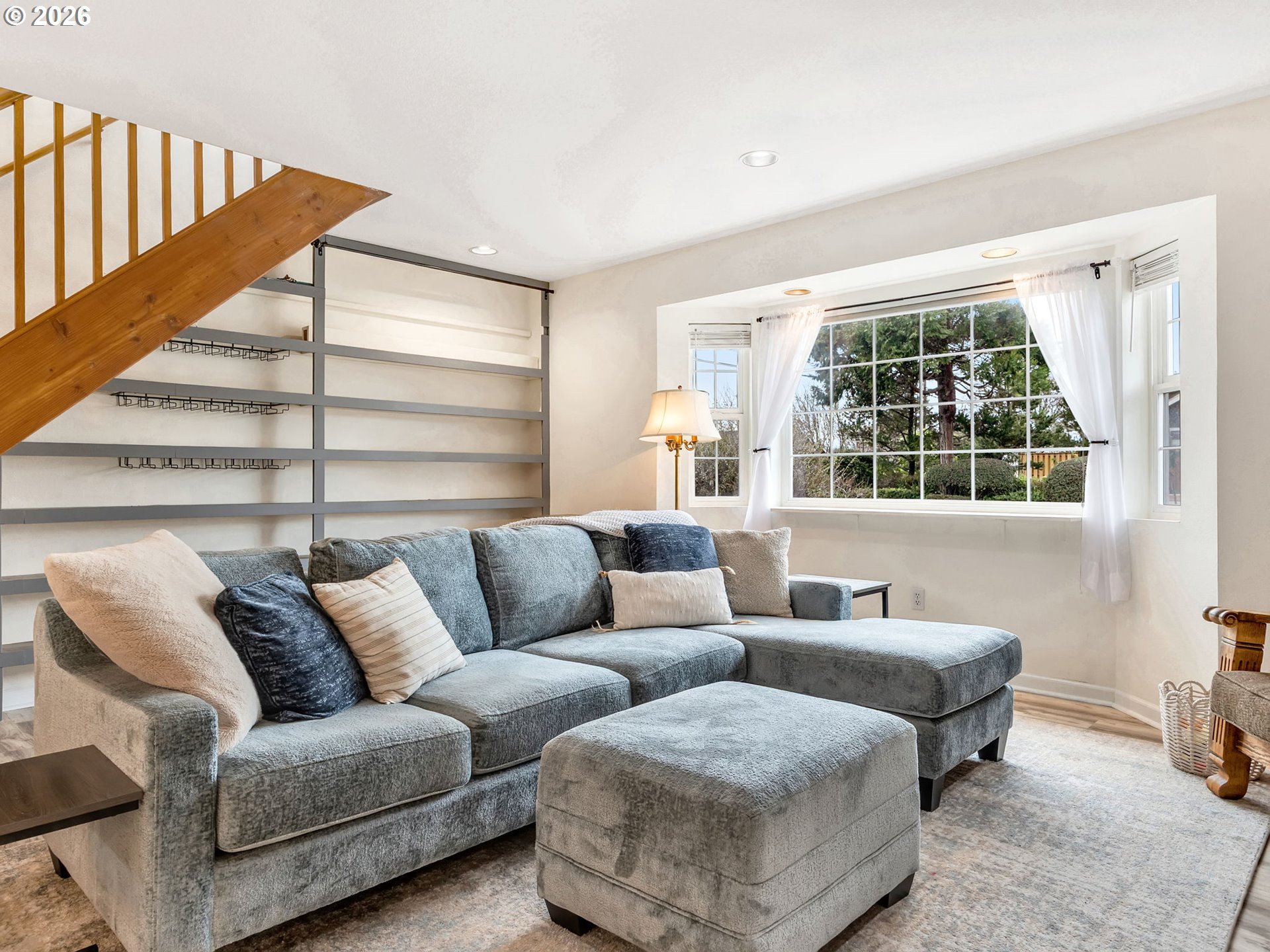 1761 South Edgewood Street Seaside, OR 97138 - Photo 23 of 48 a living room with furniture and a large window