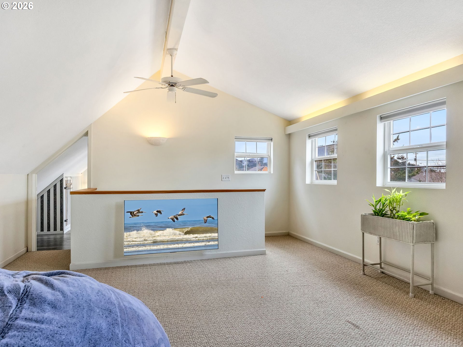 1761 South Edgewood Street Seaside, OR 97138 - Photo 28 of 48 a living room with furniture and a window