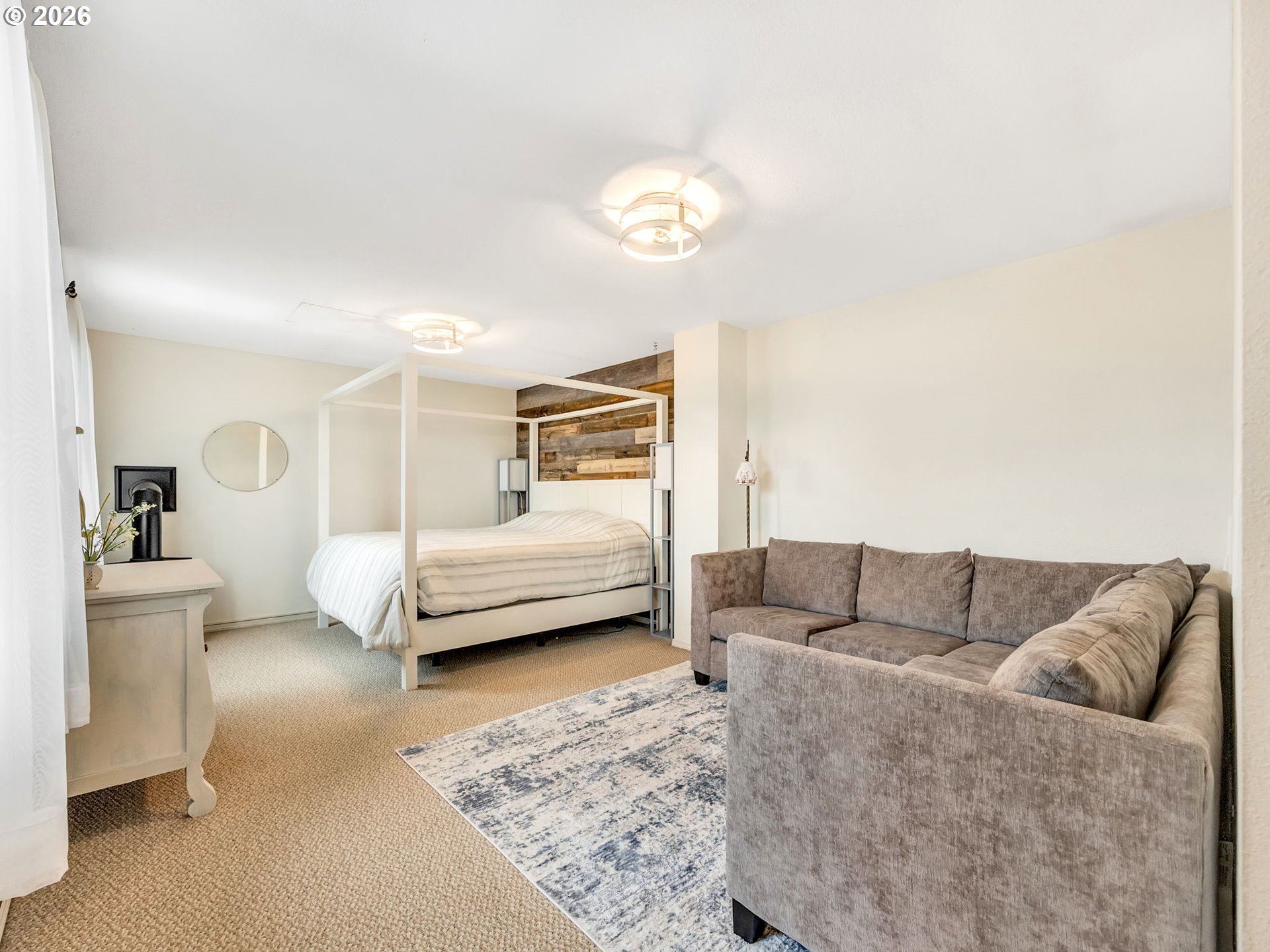 1761 South Edgewood Street Seaside, OR 97138 - Photo 35 of 48 a living room with furniture and a couch