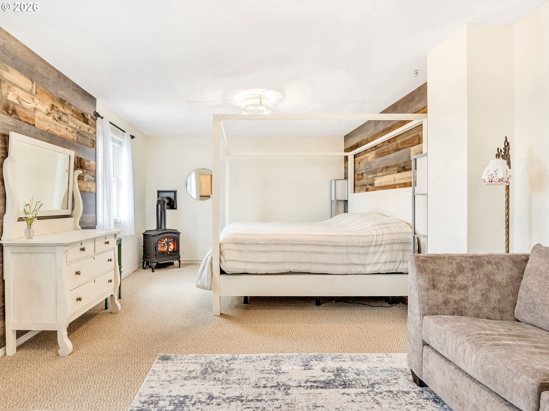 1761 South Edgewood Street Seaside, OR 97138 - Photo 36 of 48 a bedroom with a bed and dresser