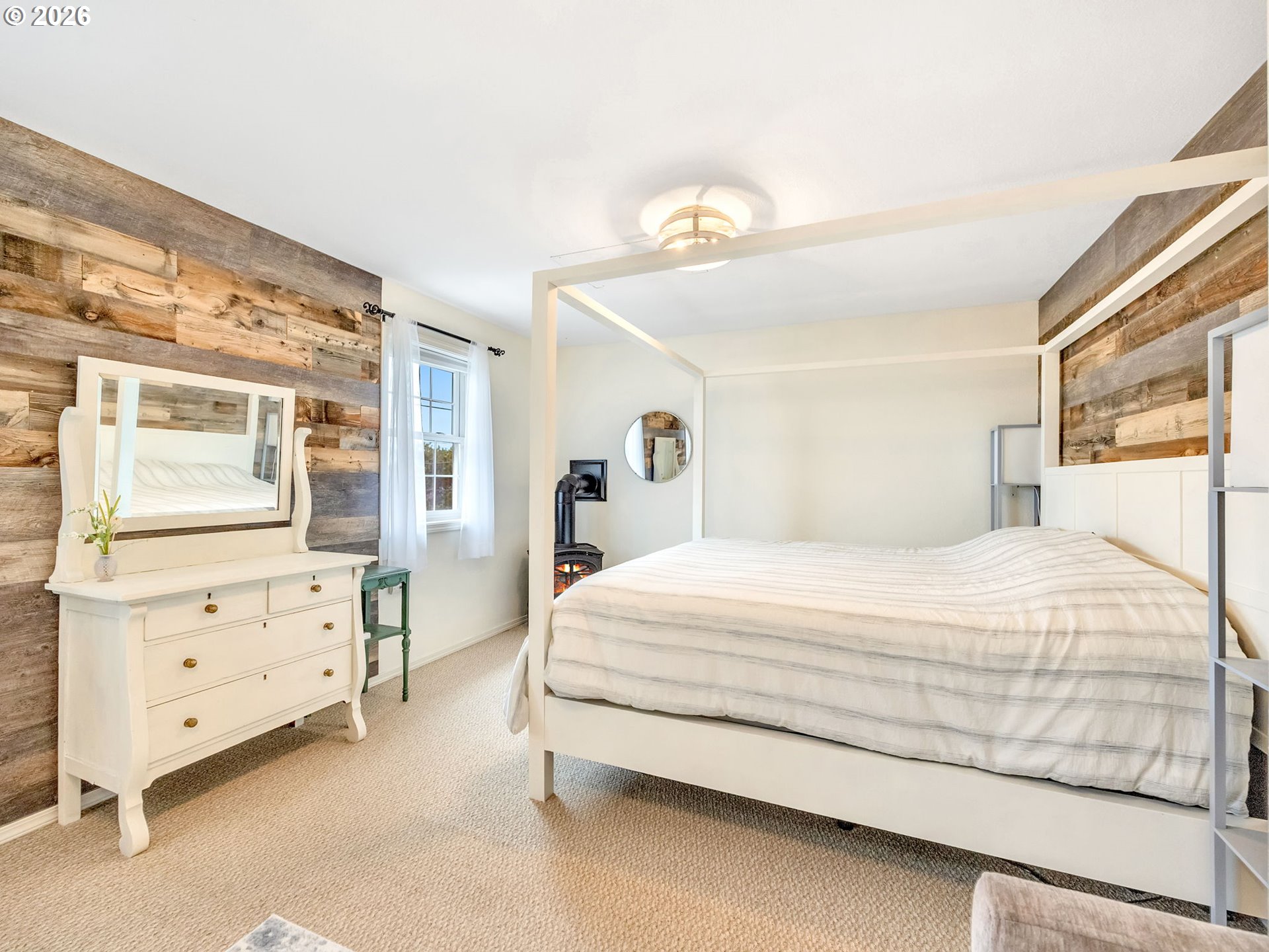 1761 South Edgewood Street Seaside, OR 97138 - Photo 37 of 48 a bedroom with a bed and dresser