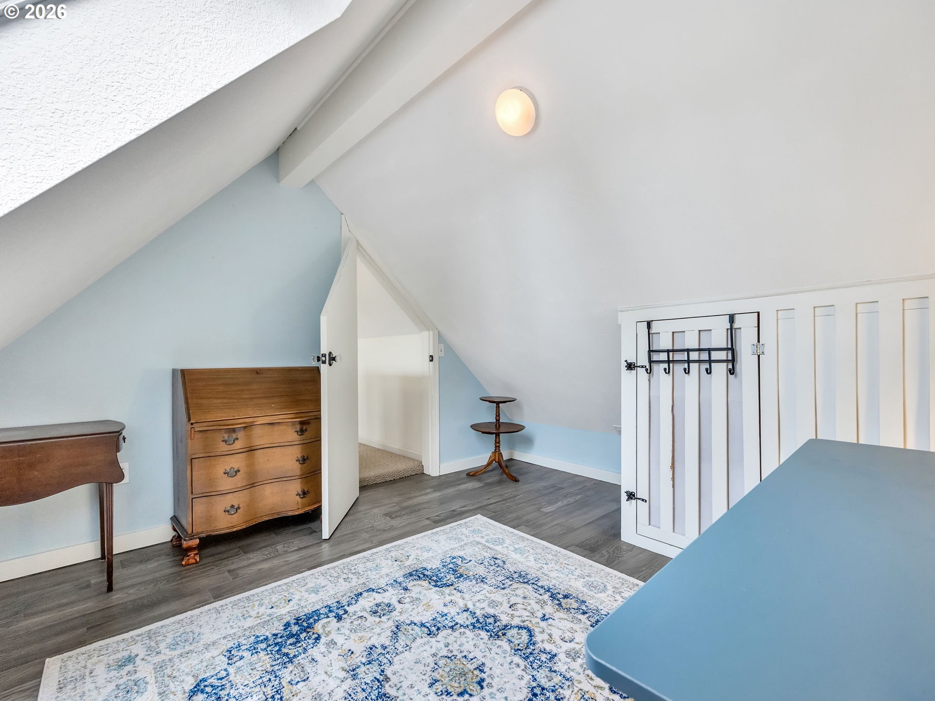 1761 South Edgewood Street Seaside, OR 97138 - Photo 40 of 48 a view of a livingroom with furniture and closet