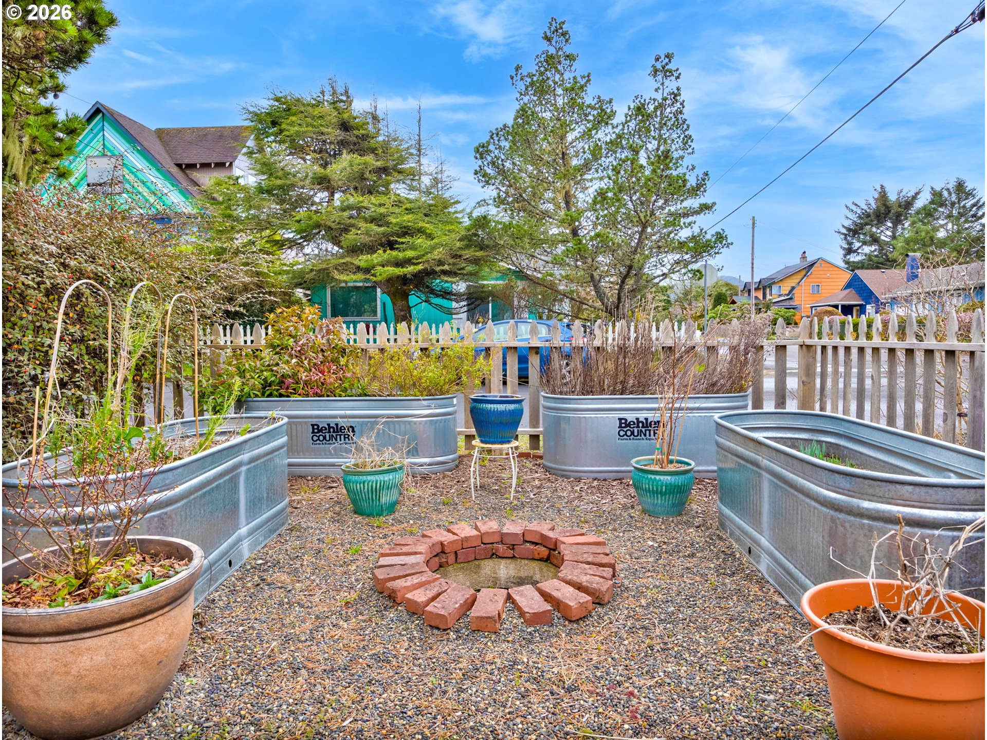 1761 South Edgewood Street Seaside, OR 97138 - Photo 43 of 48 a view of a patio with chair and tables
