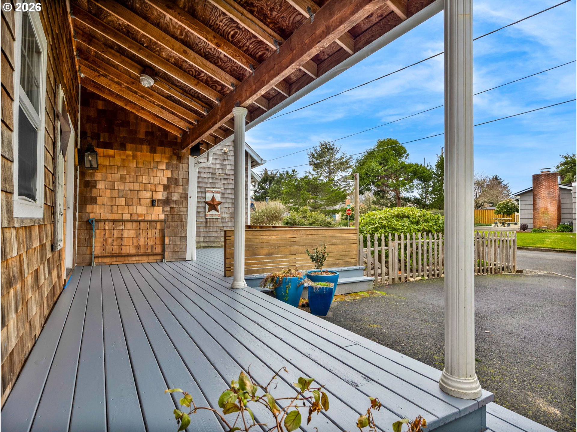 1761 South Edgewood Street Seaside, OR 97138 - Photo 44 of 48 a porch with wooden floor