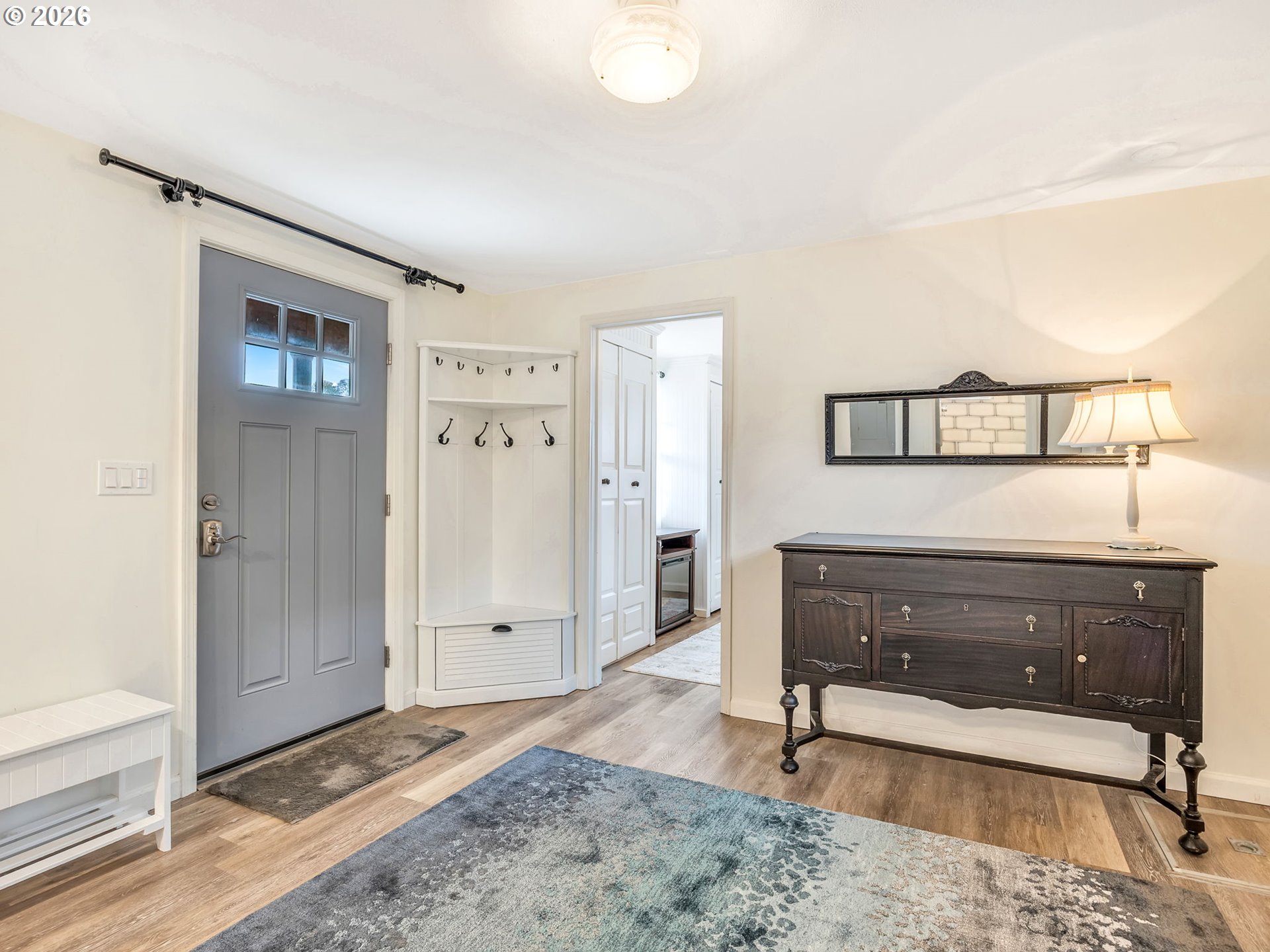 1761 South Edgewood Street Seaside, OR 97138 - Photo 5 of 48 a view of a bedroom with furniture and window