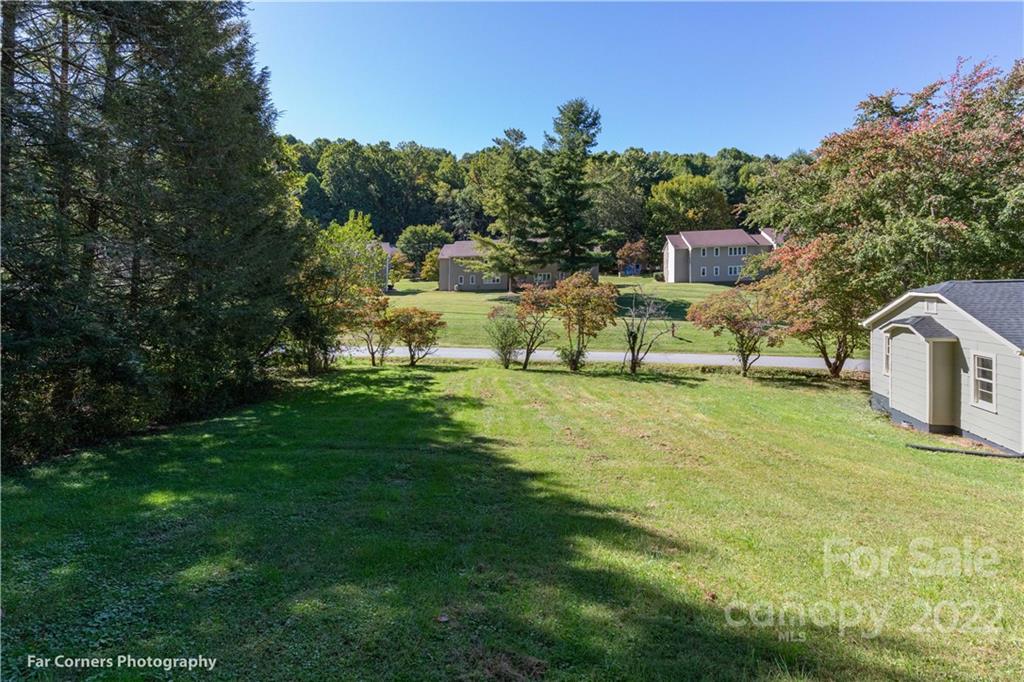 Tbd Duckett Cv Road Waynesville, NC 28786 - Photo 3 of 3 a view of a garden with houses