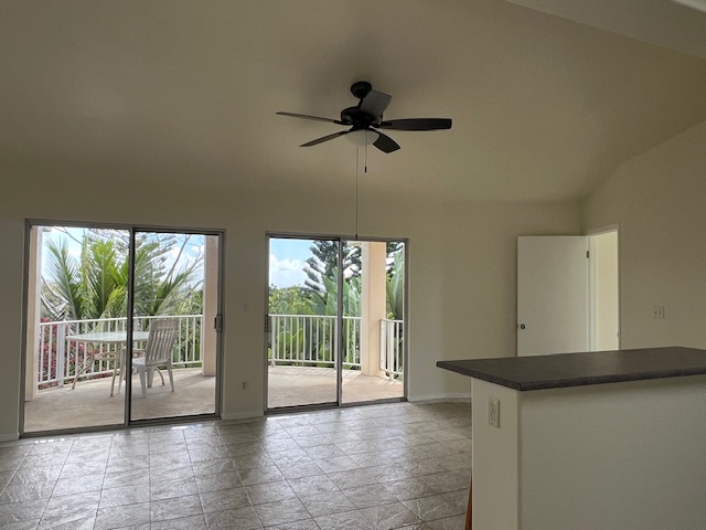 3320 B Wawae Road Kalaheo, HI 96741 - Photo 6 of 15 a view of an empty room with wooden floor and a window