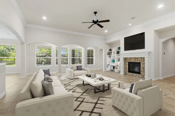 a bathroom with a sink a toilet a mirror and bathtub