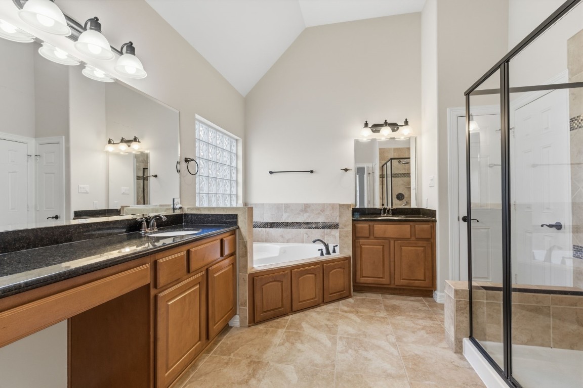 17711 Ravenno Lane Spring, TX 77379 - Photo 23 of 50 Luxurious Bath with dual sinks, vanity, jetted tub and shower