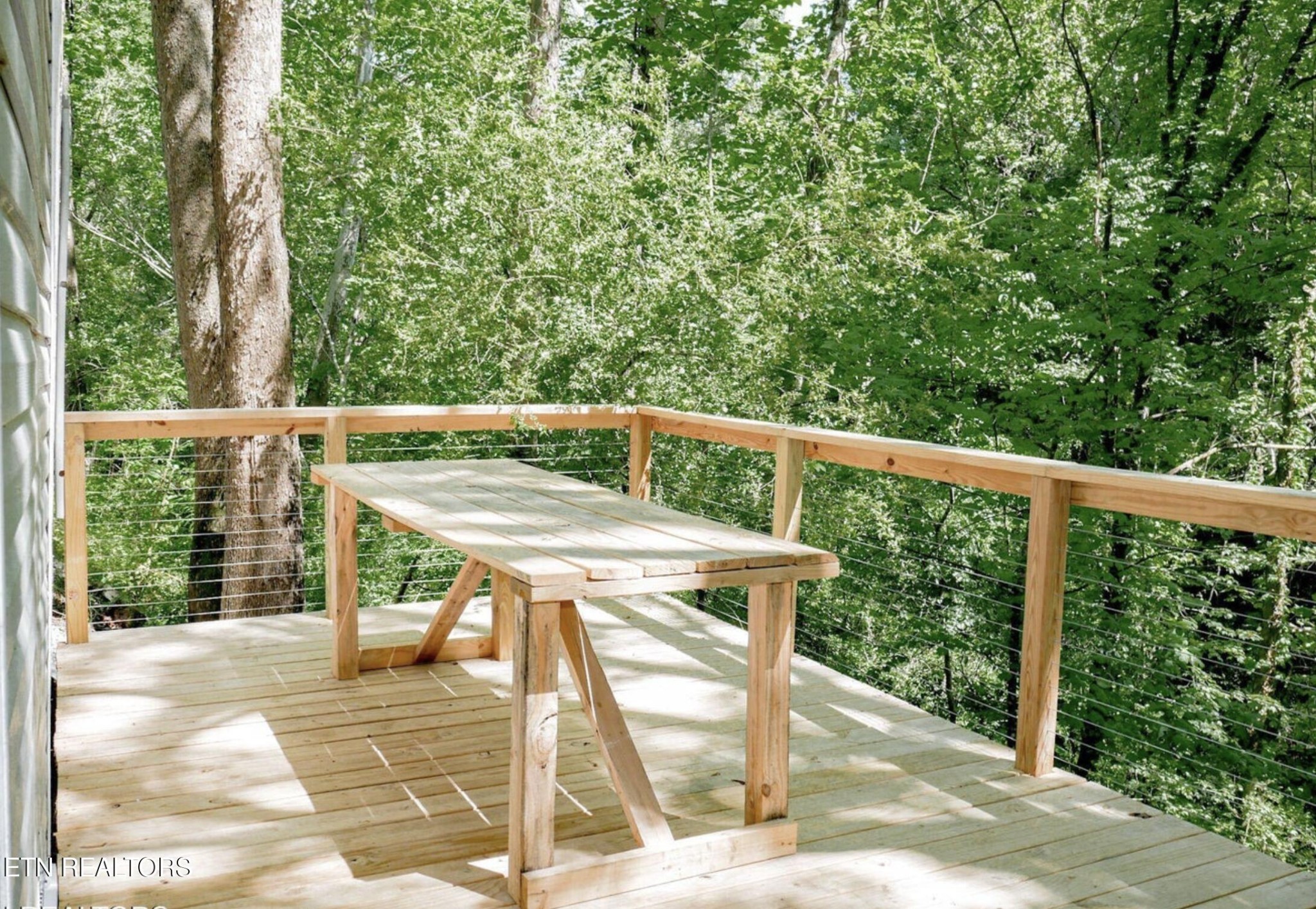 643 Airport Road Oakdale, TN 37829 - Photo 13 of 56 a view of a balcony with furniture