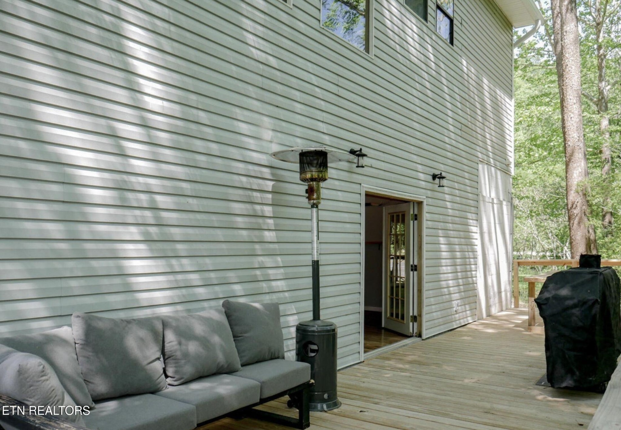 643 Airport Road Oakdale, TN 37829 - Photo 14 of 56 a view of a balcony with furniture and a window