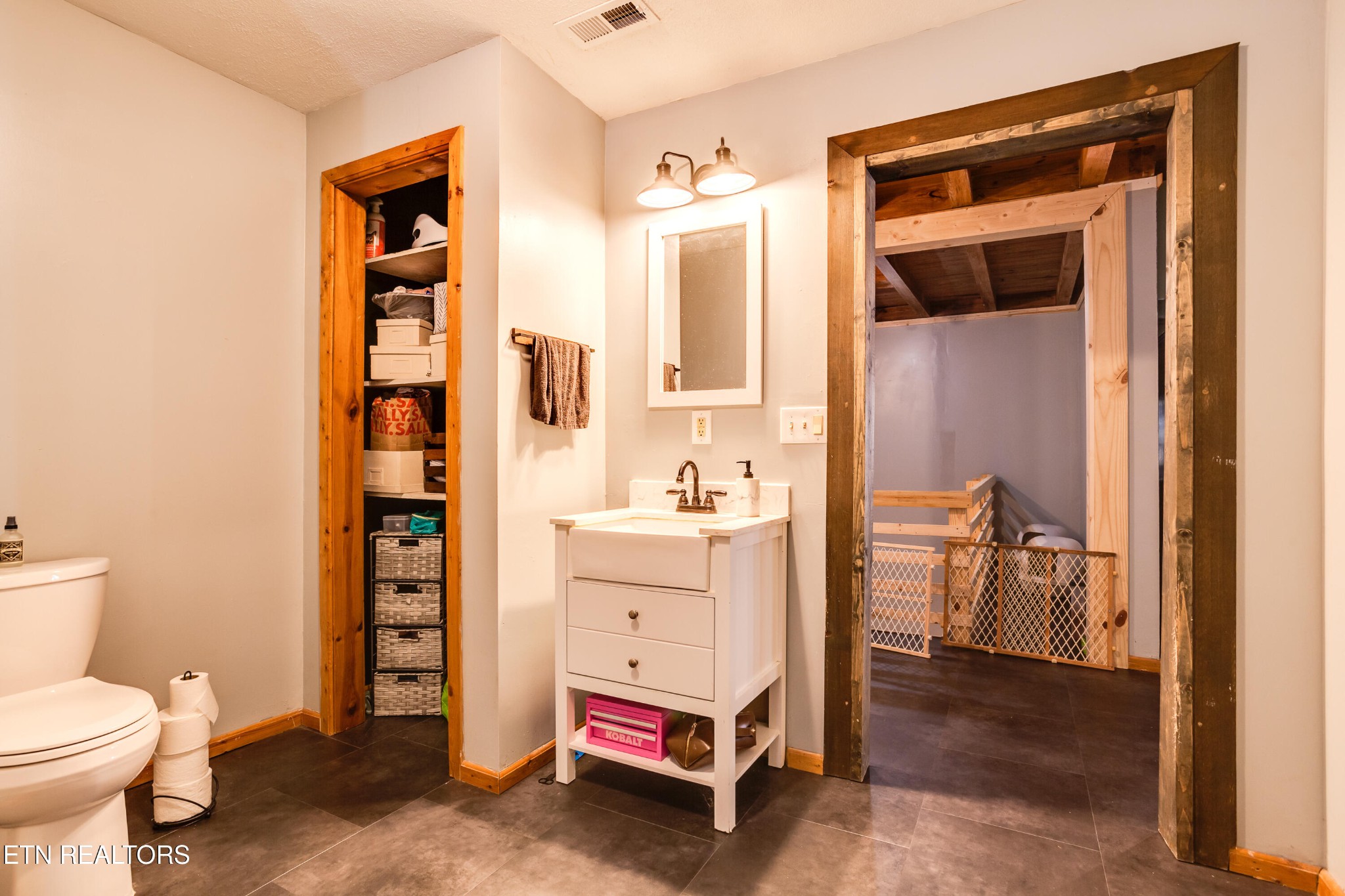 643 Airport Road Oakdale, TN 37829 - Photo 24 of 56 a room that has a bed and a chair in it