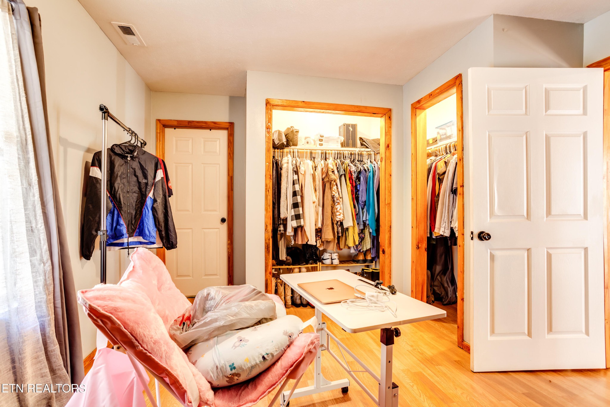 643 Airport Road Oakdale, TN 37829 - Photo 27 of 56 a bed room with a bed and a window