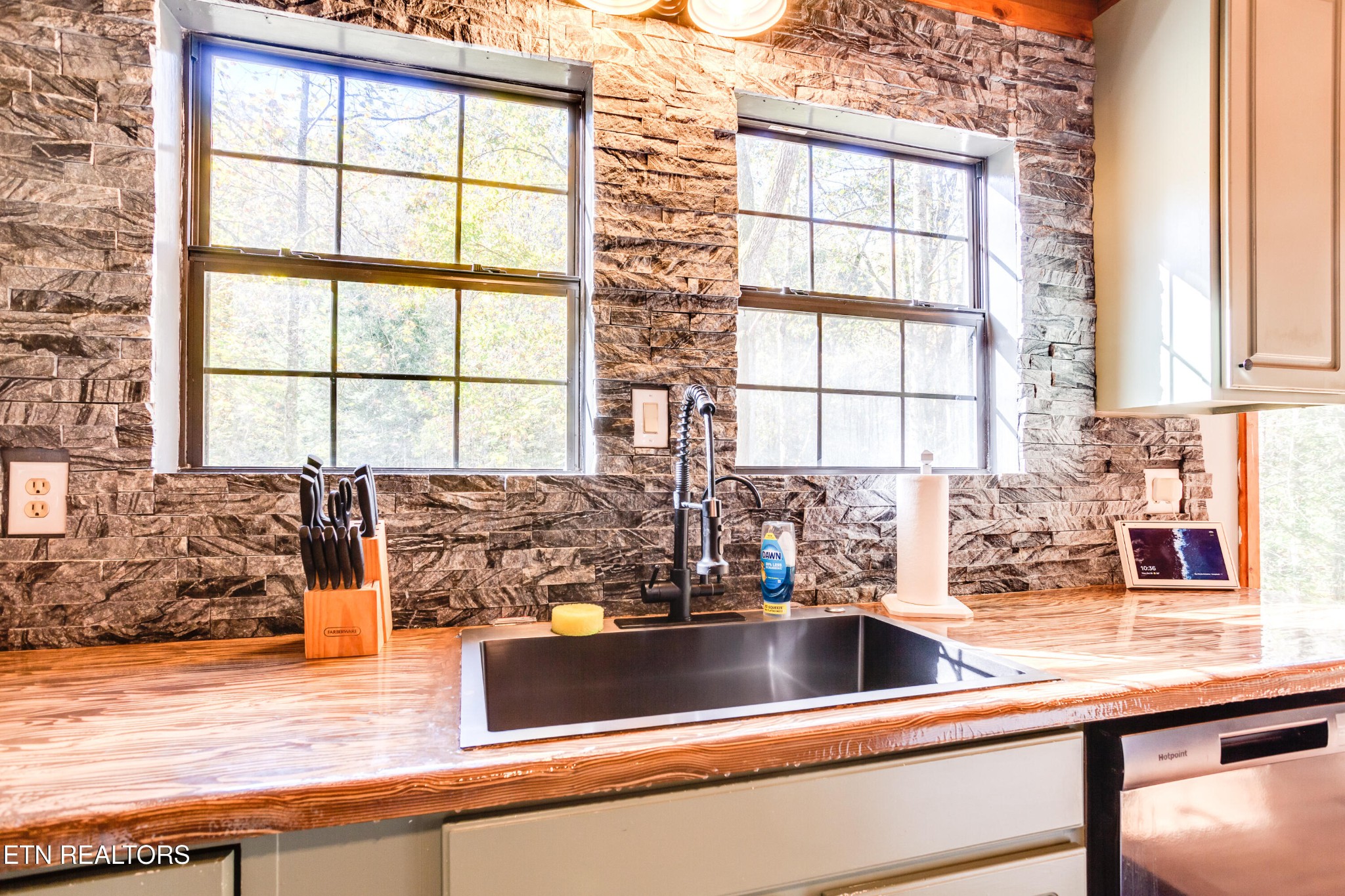 643 Airport Road Oakdale, TN 37829 - Photo 30 of 56 a kitchen with a sink and large window