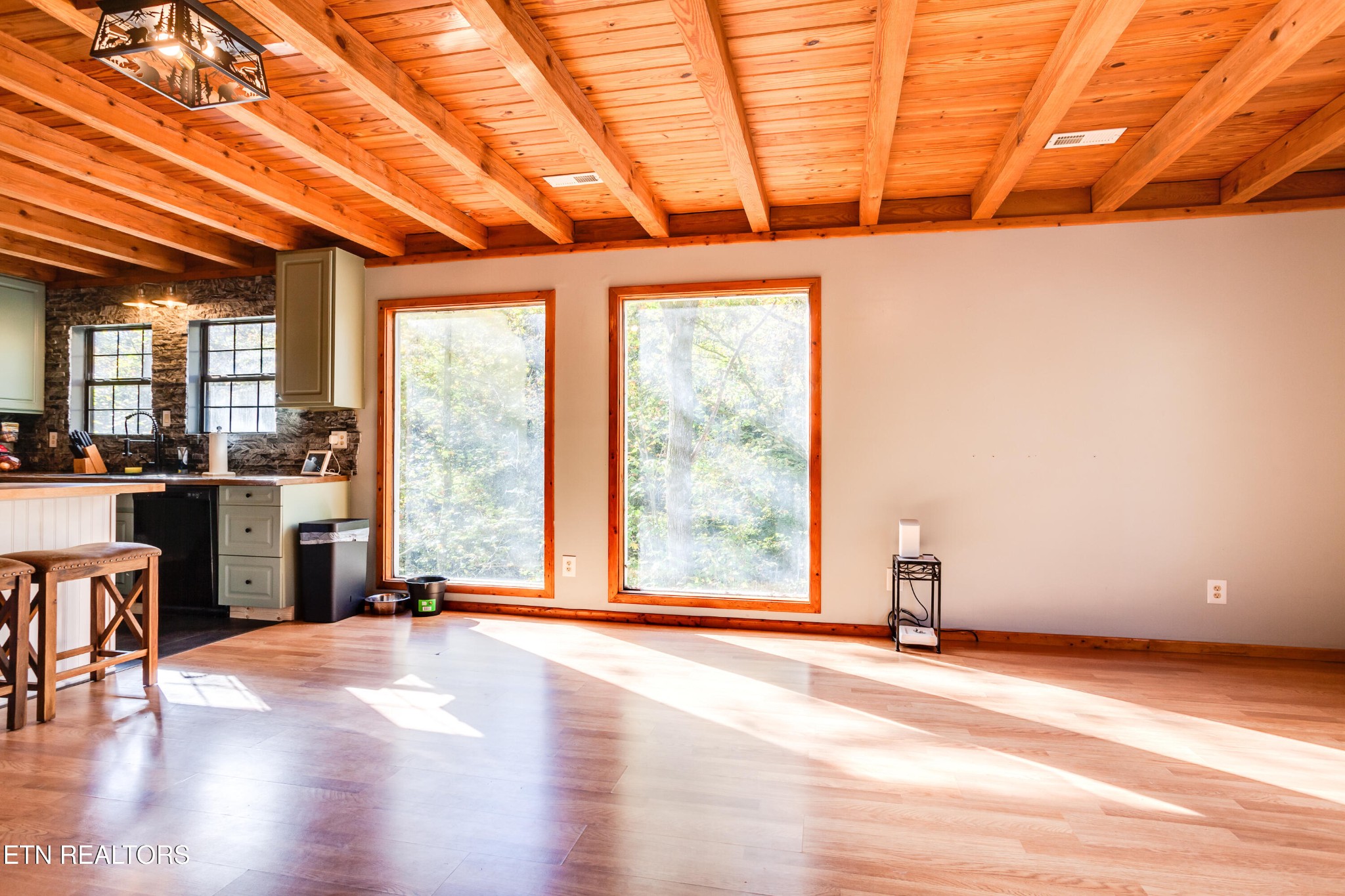 643 Airport Road Oakdale, TN 37829 - Photo 34 of 56 a view of a room with wooden floor and iron stairs