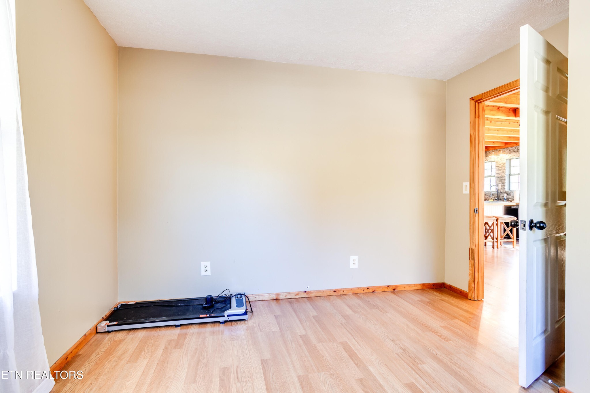 643 Airport Road Oakdale, TN 37829 - Photo 37 of 56 a view of a room with wooden floor and a window