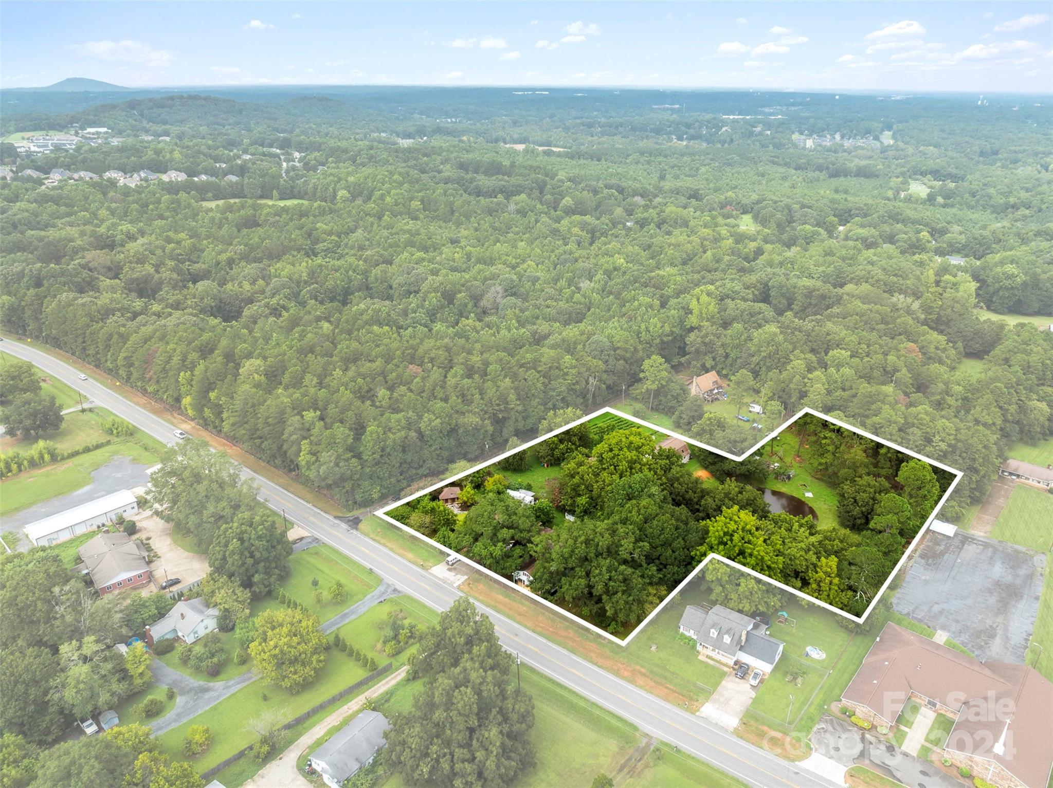 4539 South New Hope Road Belmont, NC 28012 - Photo 11 of 26 a view of a lake from a balcony