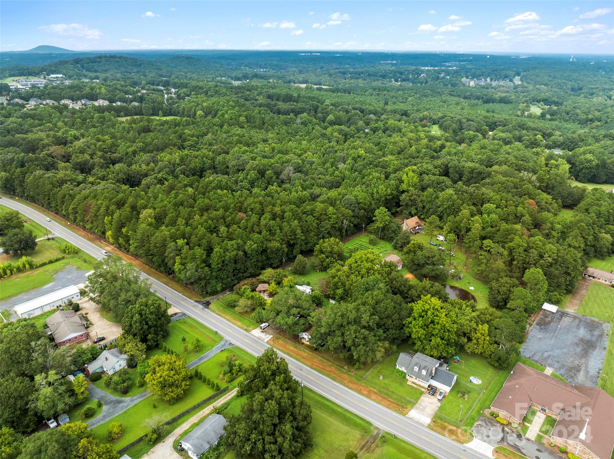 4539 South New Hope Road Belmont, NC 28012 - Photo 12 of 26 a view of a garden from a balcony