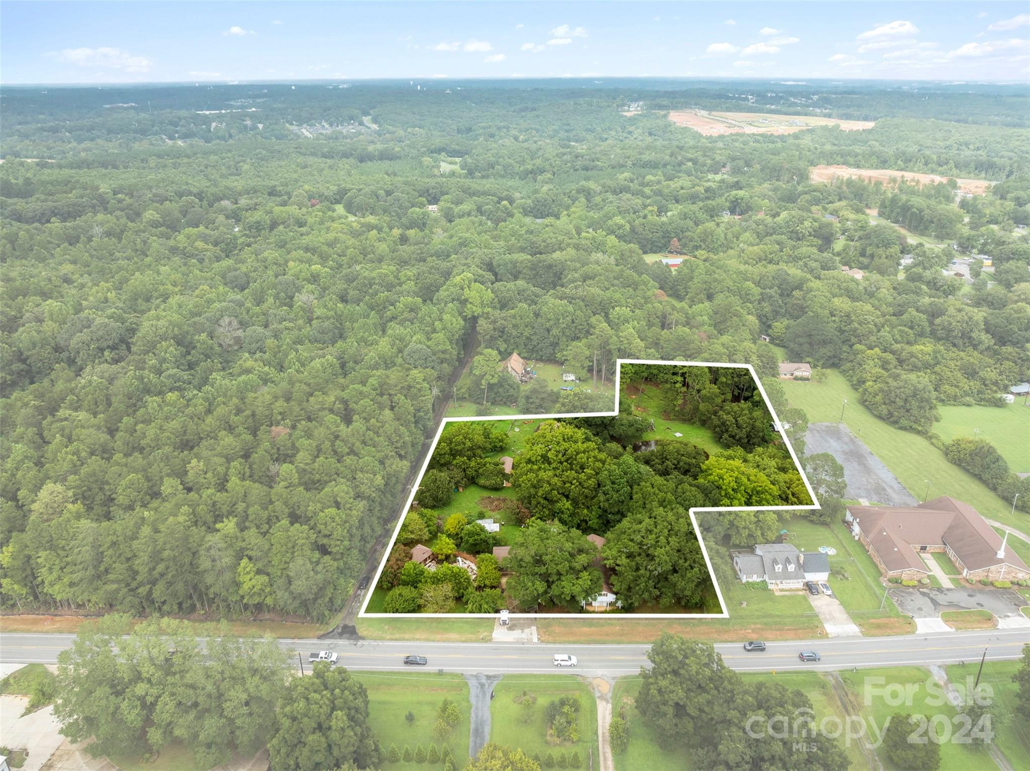 4539 South New Hope Road Belmont, NC 28012 - Photo 13 of 26 a view of a yard with an outdoor seating