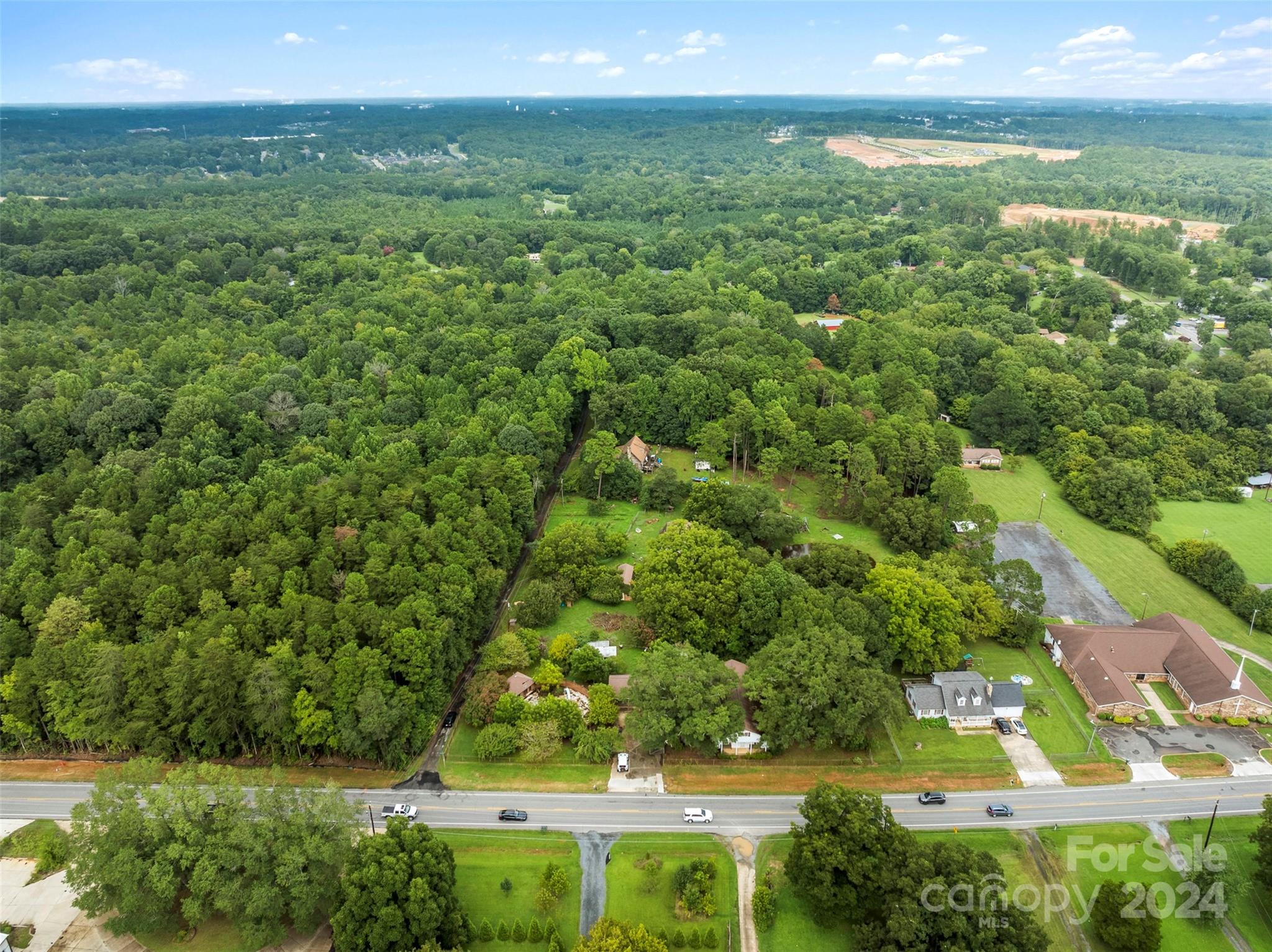 4539 South New Hope Road Belmont, NC 28012 - Photo 14 of 26 a view of an outdoor space and a yard