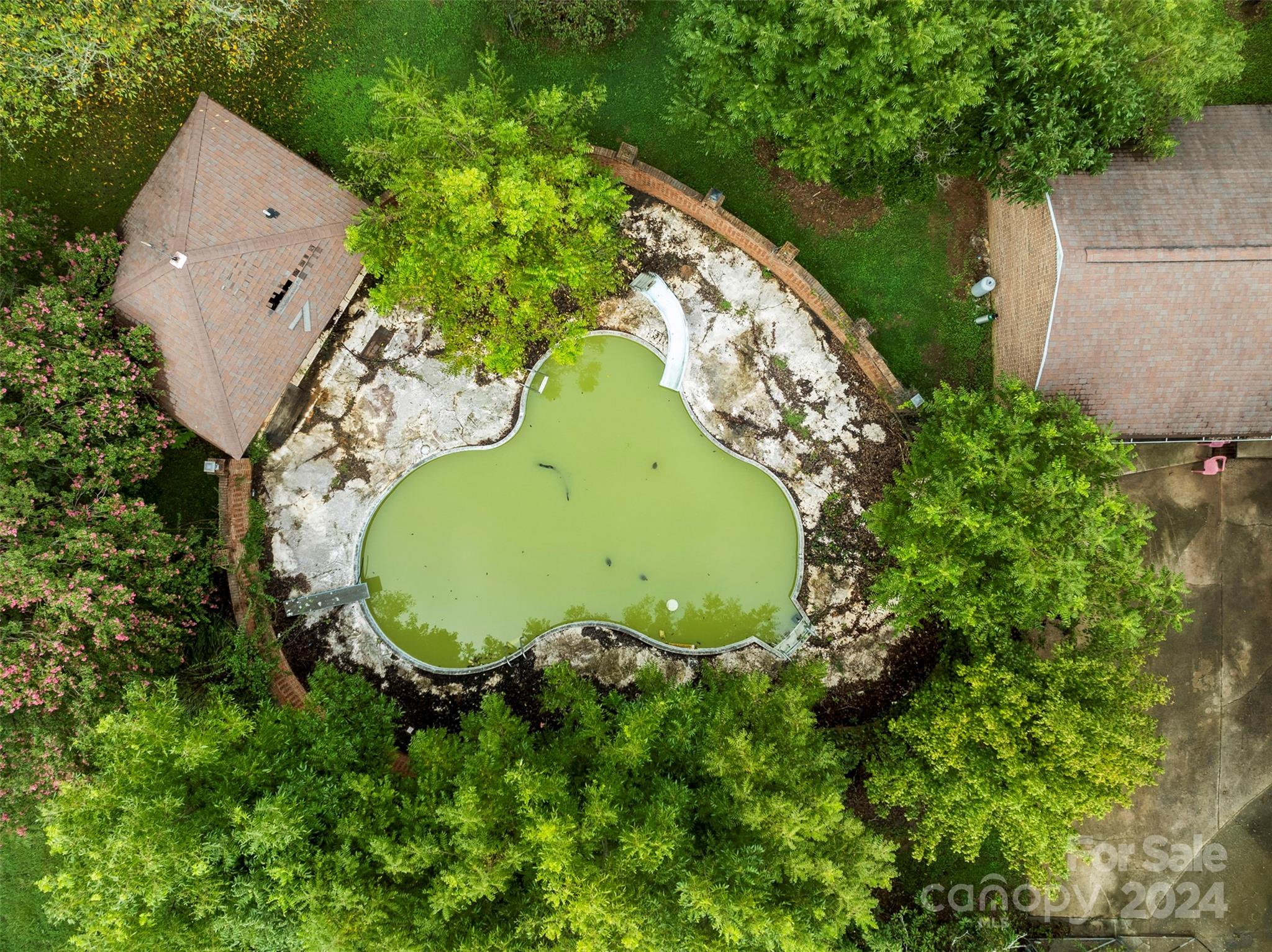 4539 South New Hope Road Belmont, NC 28012 - Photo 16 of 26 an aerial view of a house with a yard and plants