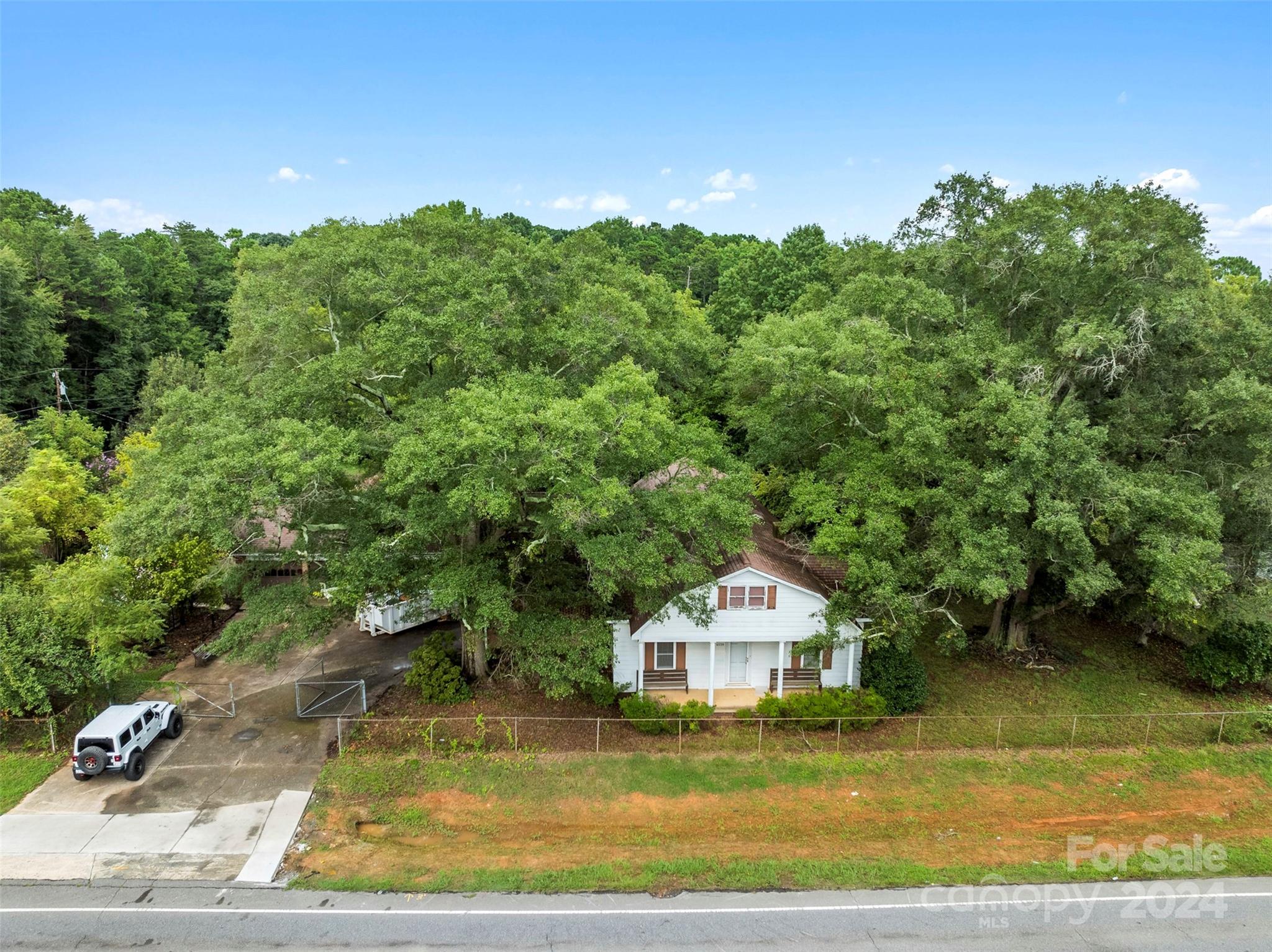 4539 South New Hope Road Belmont, NC 28012 - Photo 17 of 26 a view of a house with a big yard