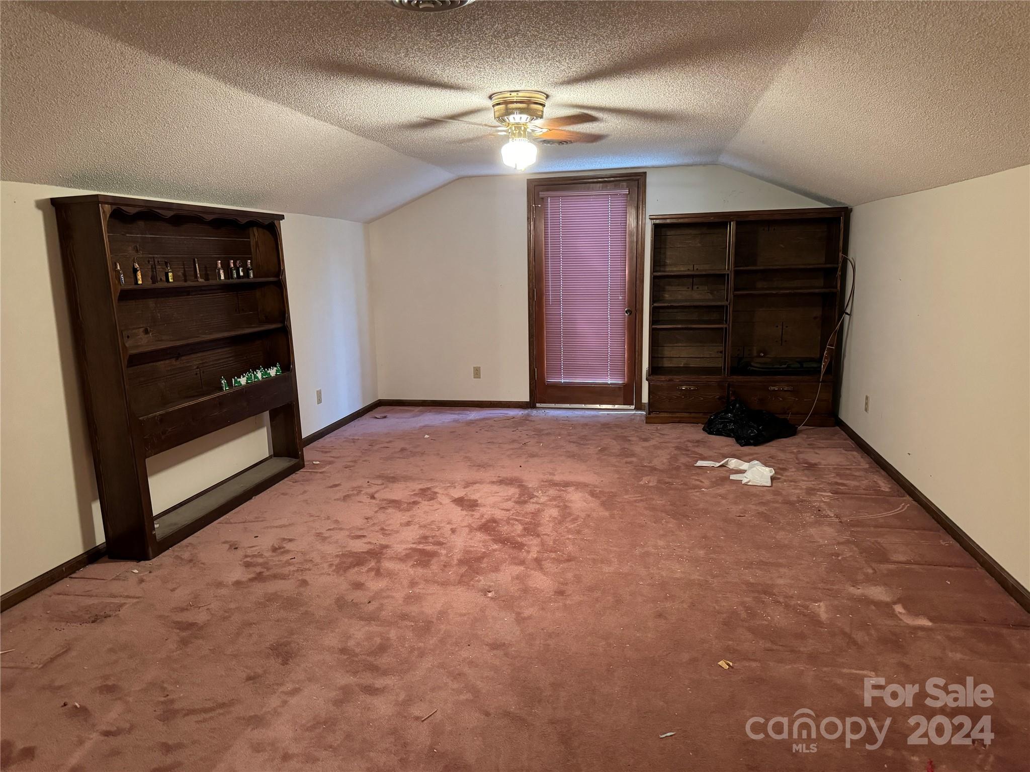 4539 South New Hope Road Belmont, NC 28012 - Photo 25 of 26 a view of an empty room with closet and cabinet