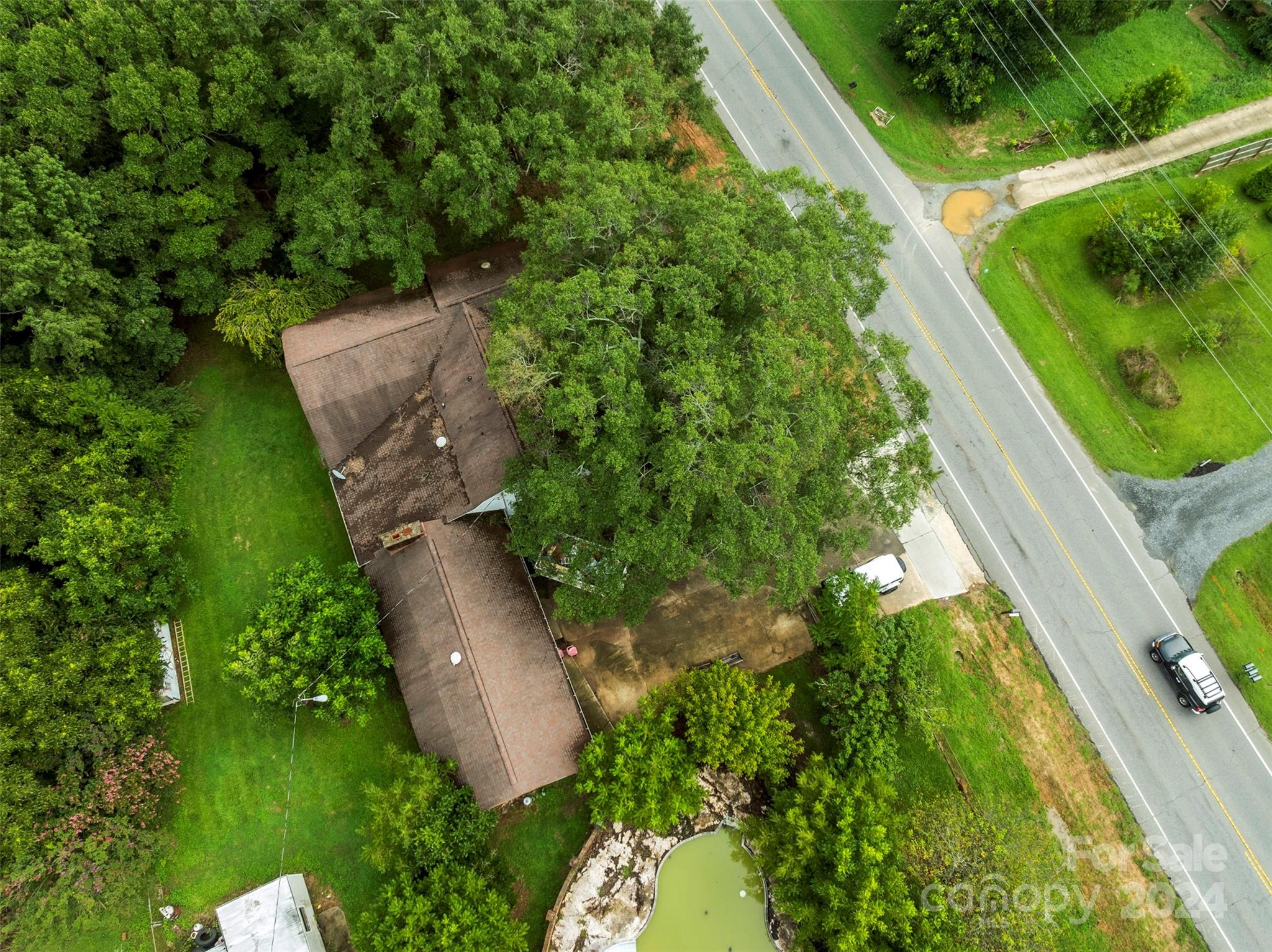 4539 South New Hope Road Belmont, NC 28012 - Photo 3 of 26 an aerial view of a residential houses with outdoor space