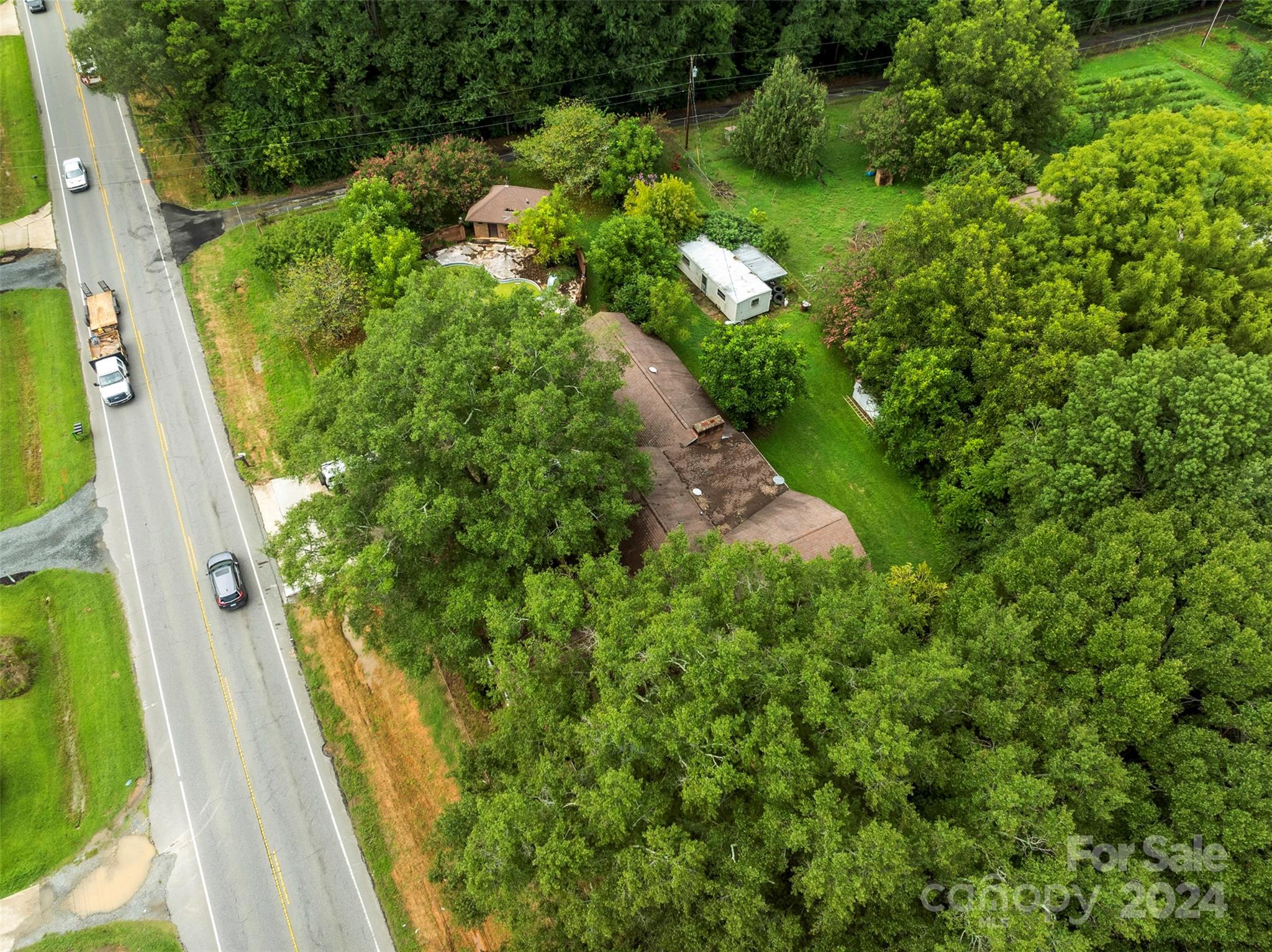 4539 South New Hope Road Belmont, NC 28012 - Photo 5 of 26 a view of a garden with a fountain