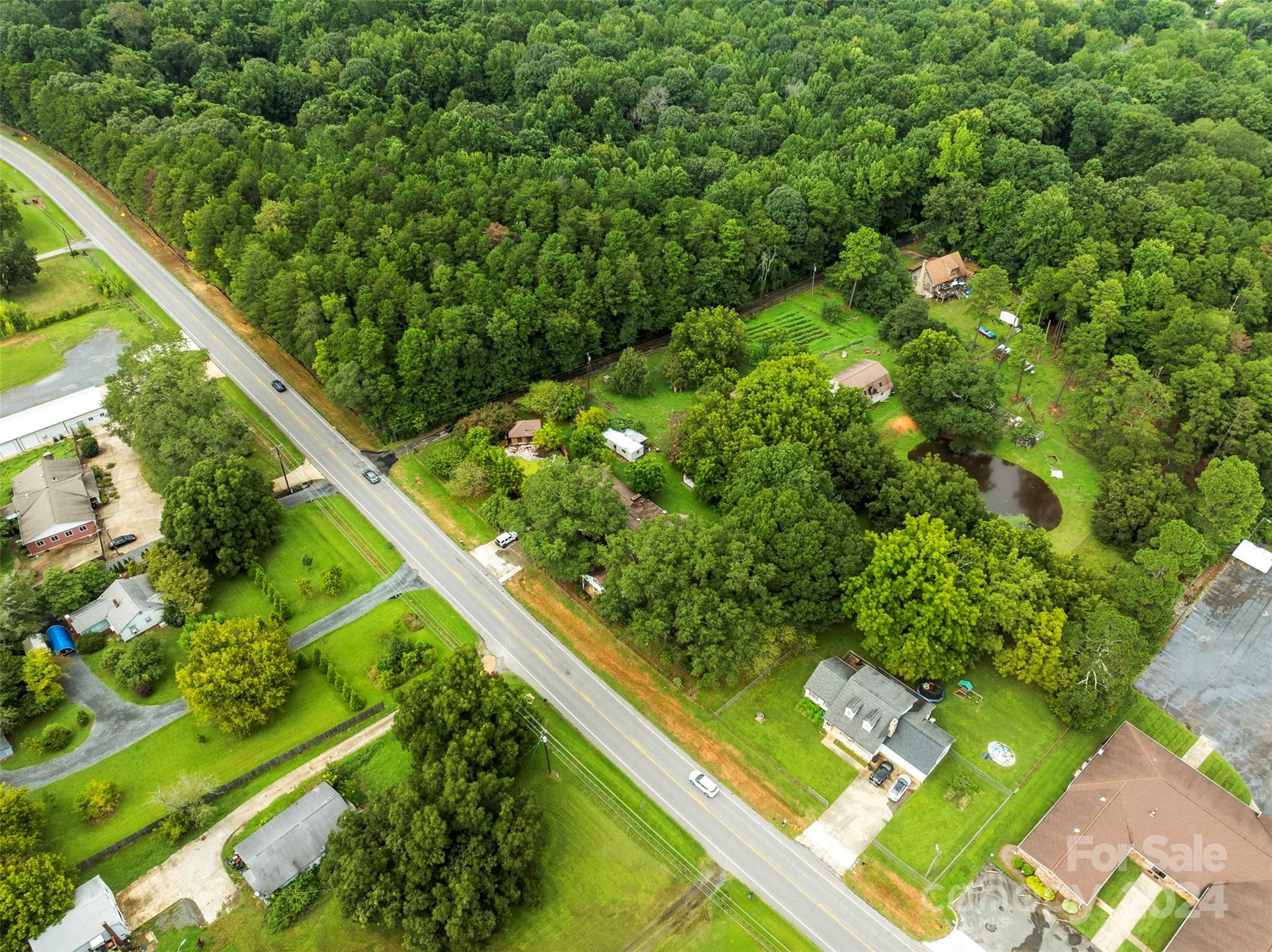 4539 South New Hope Road Belmont, NC 28012 - Photo 10 of 26 a view of a garden with an outdoor seating
