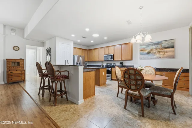 a bathroom with a bathtub and a window