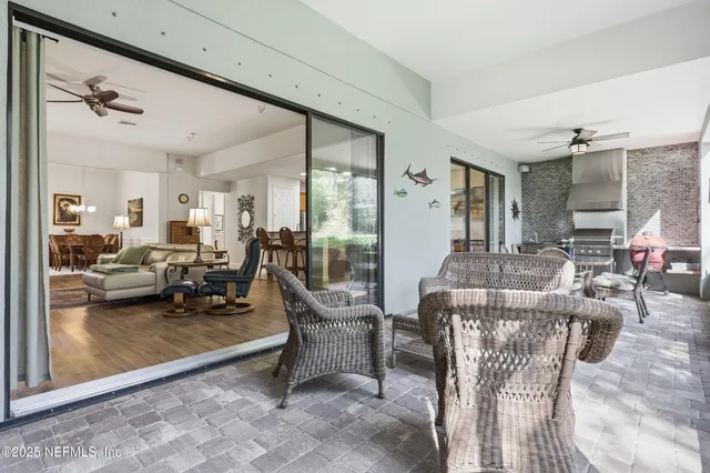 a sign that is sitting in front of flowers