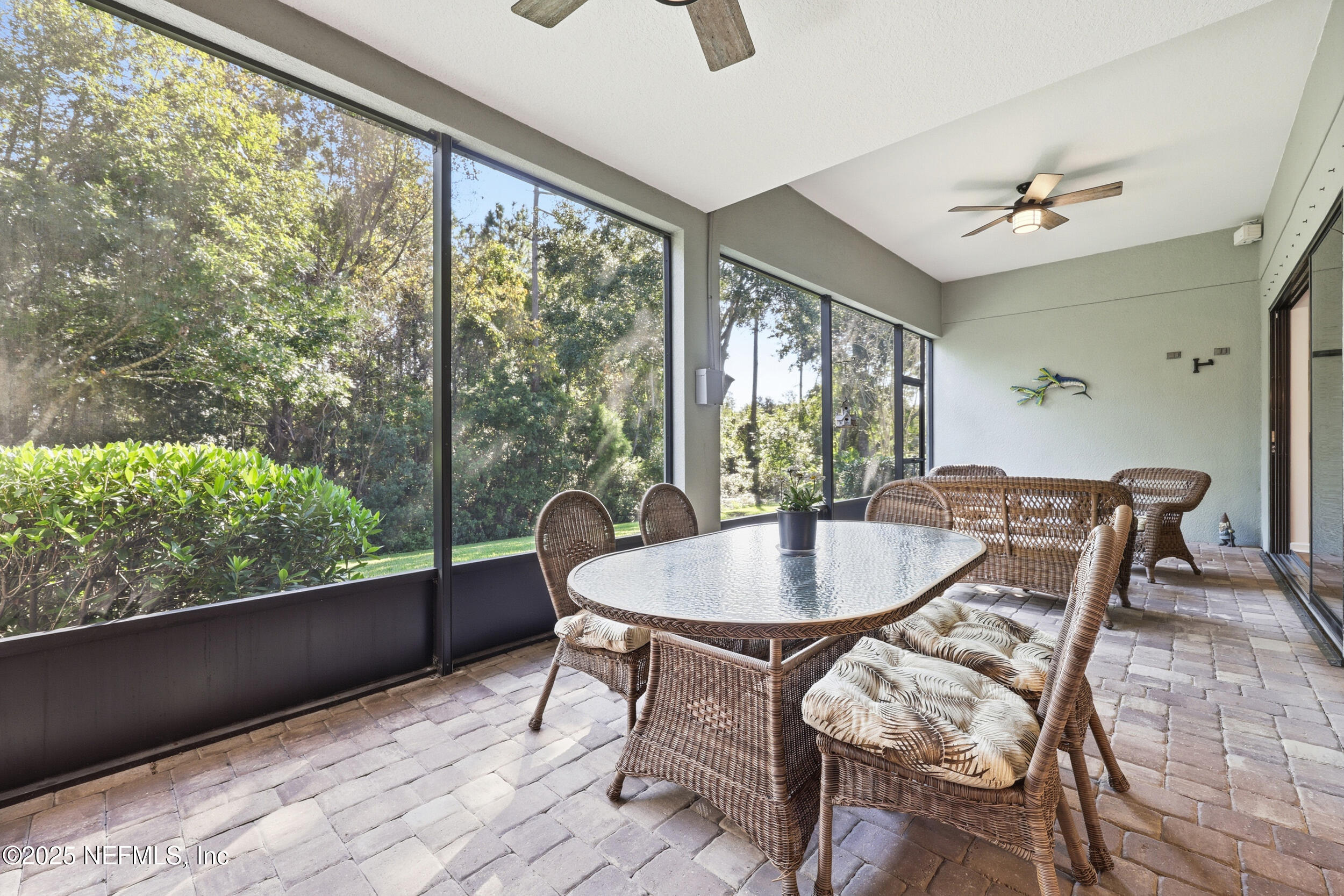 653 River Run Boulevard Ponte Vedra, FL 32081 - Photo 42 of 130 a dining room with furniture window and wooden floor
