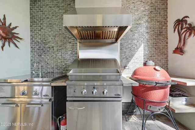 an aerial view of residential house with outdoor space