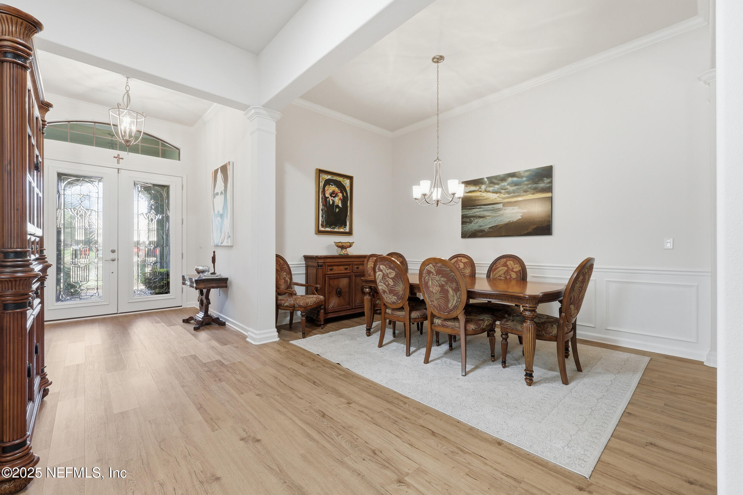 653 River Run Boulevard Ponte Vedra, FL 32081 - Photo 6 of 130 a view of a dining room with furniture and wooden floor