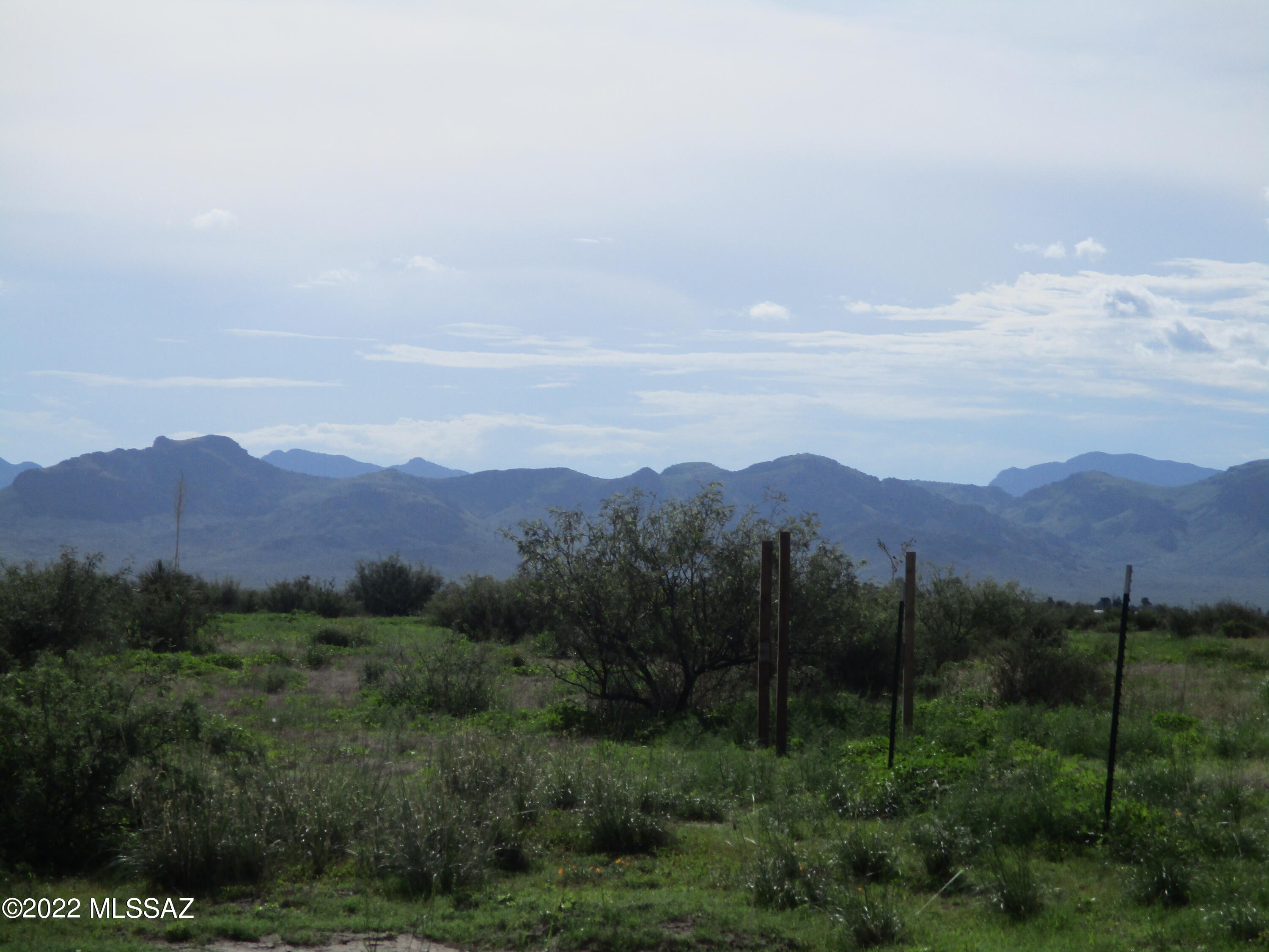 1453 North Taylor Road Willcox, AZ 85643 - Photo 30 of 31 a view of a town with mountains in the background