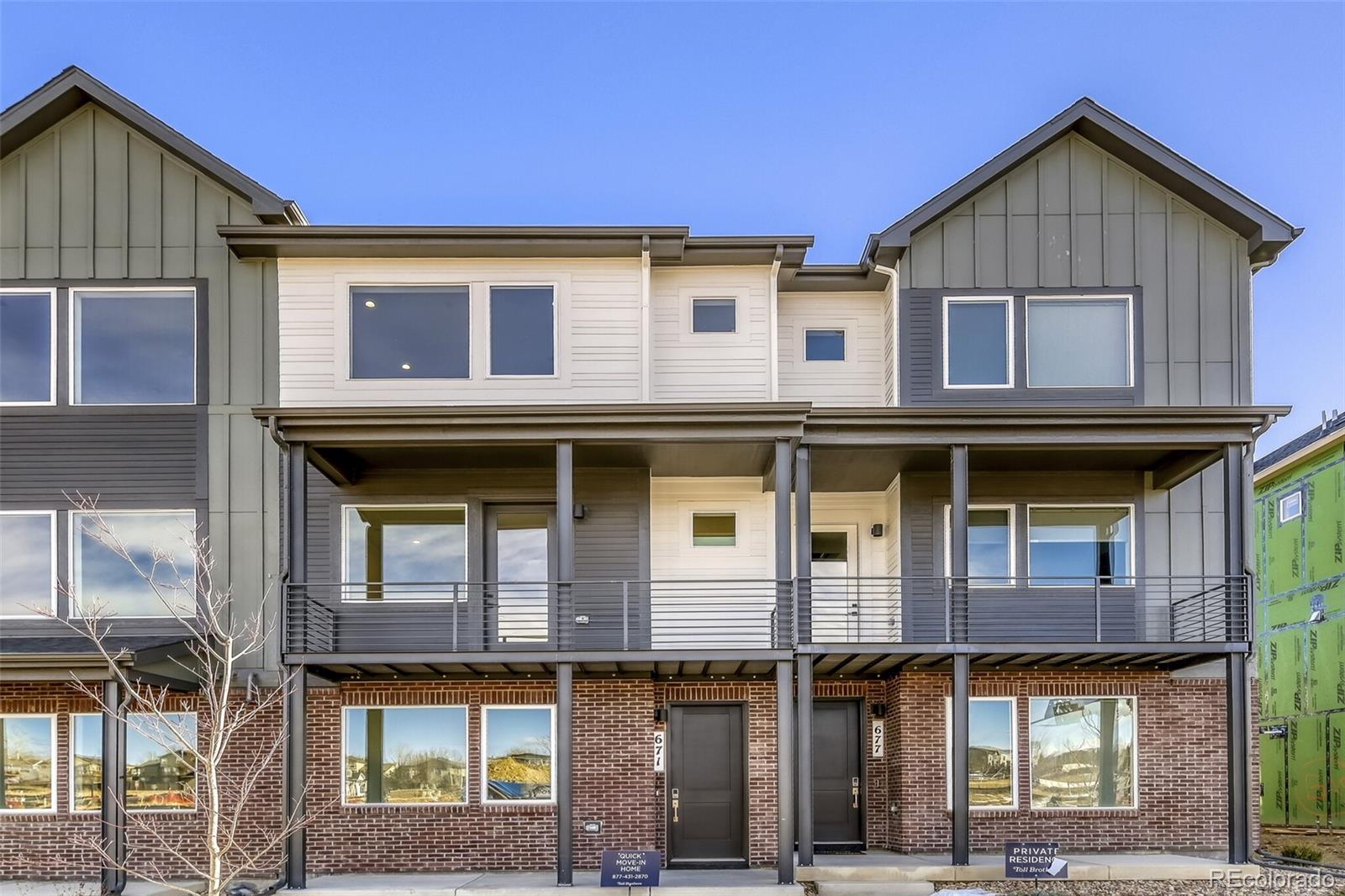 671 Skyhook Street Erie, CO 80516 - Photo 1 of 31 a front view of residential houses